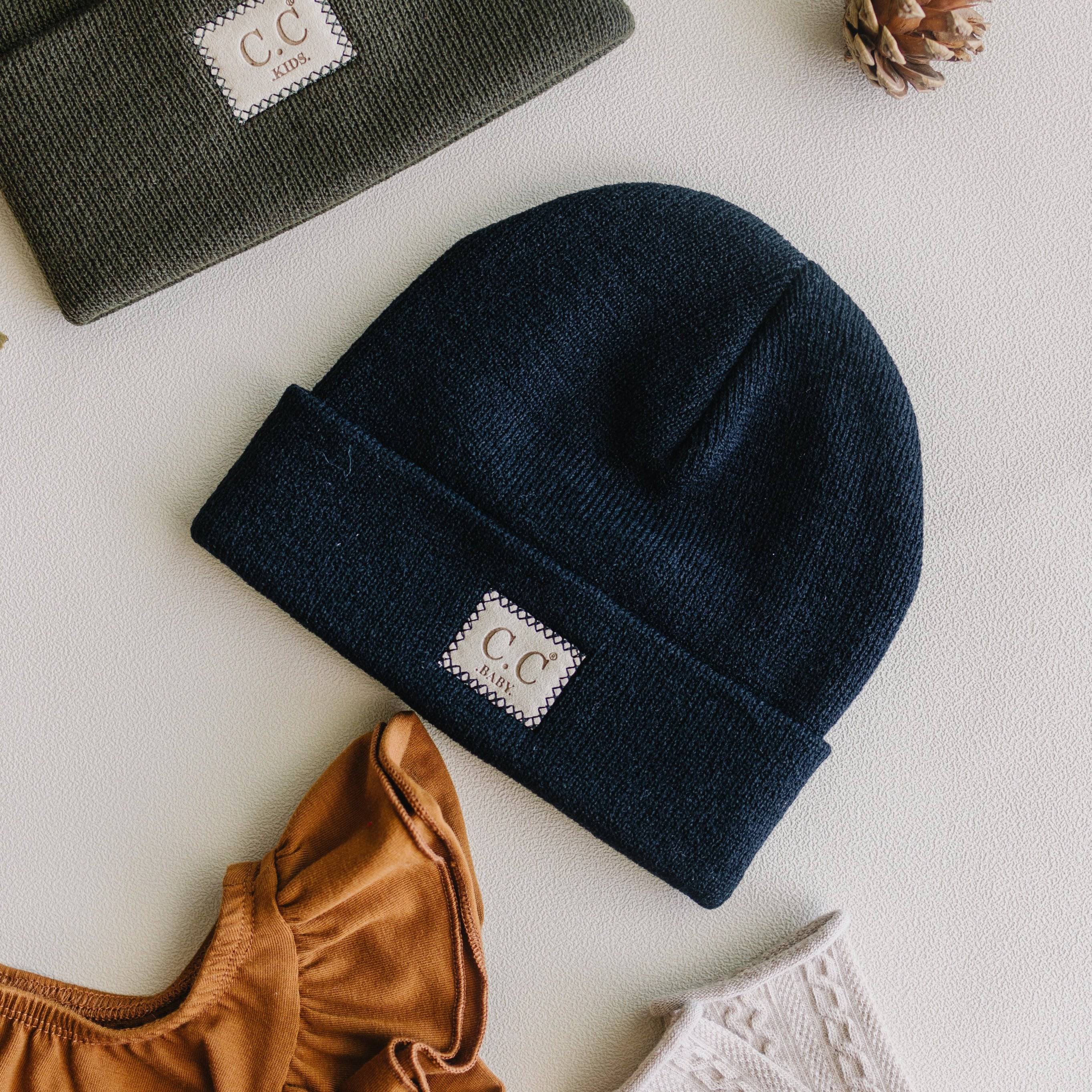 CC Baby Classic Unisex Ribbed Beanie Hats in various colors, showcasing the ribbed texture and C.C branding.