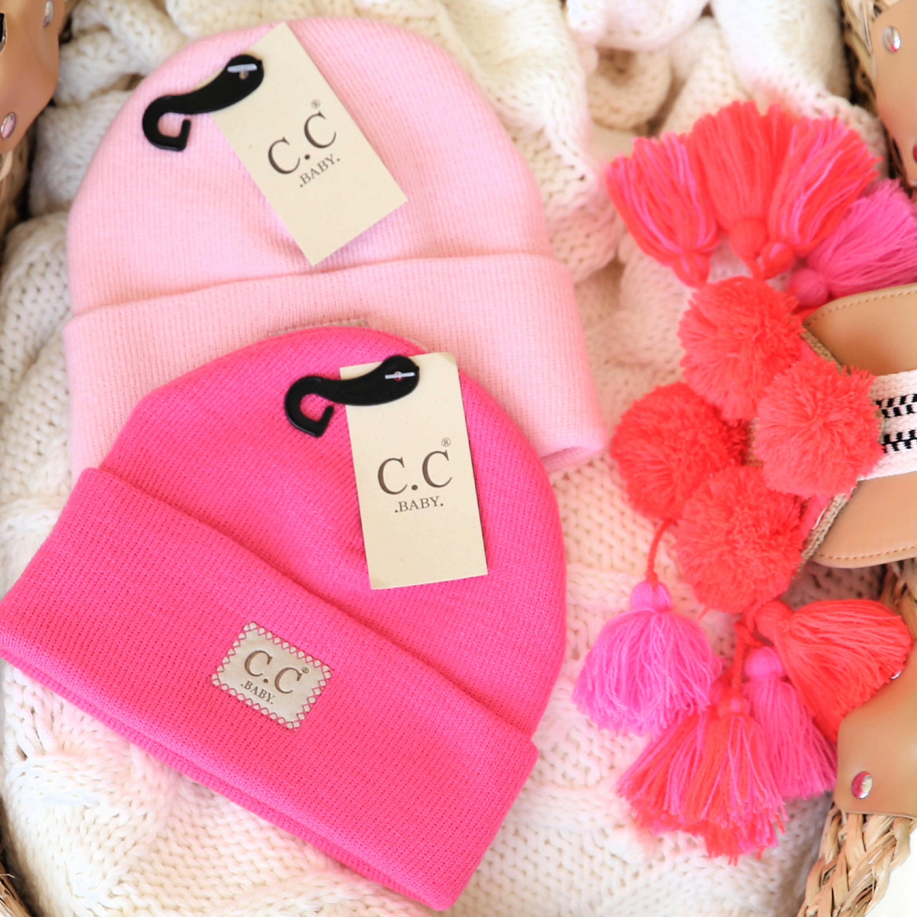 CC Baby Classic Unisex Ribbed Beanie Hats in various colors, showcasing the ribbed texture and C.C branding.