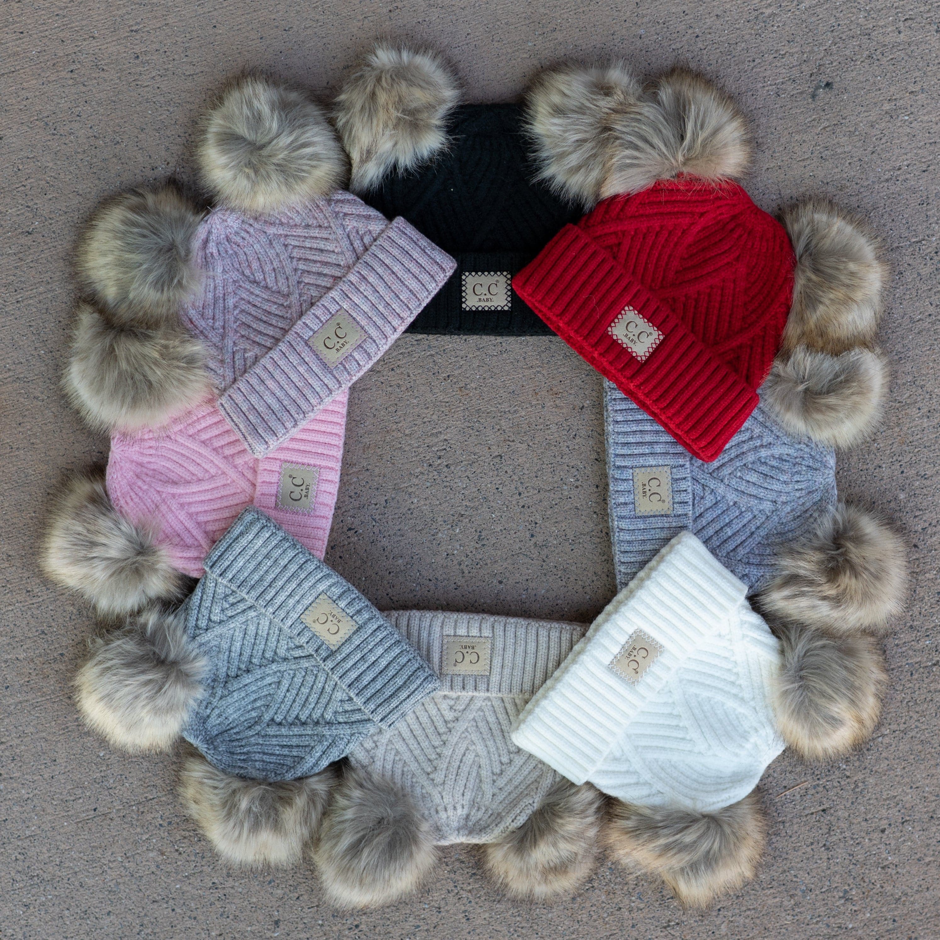 CC Baby Double Pom Beanie with criss-cross pattern and faux fur pom, perfect for toddlers and babies.