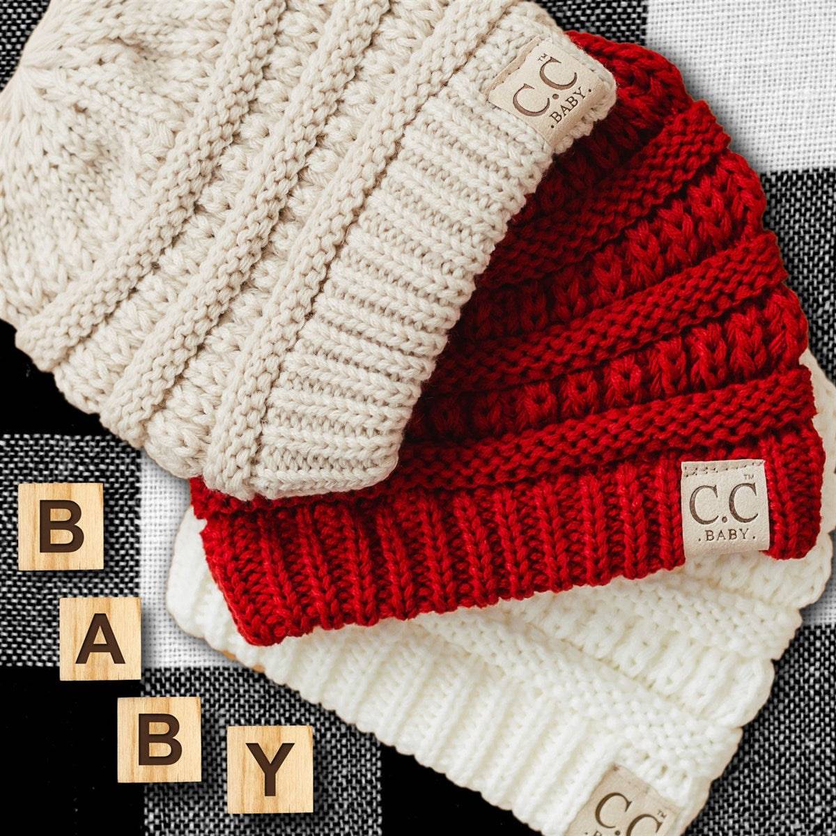 C.C Beanie Baby winter hats in various colors for newborns to 12 years, made from soft acrylic material.