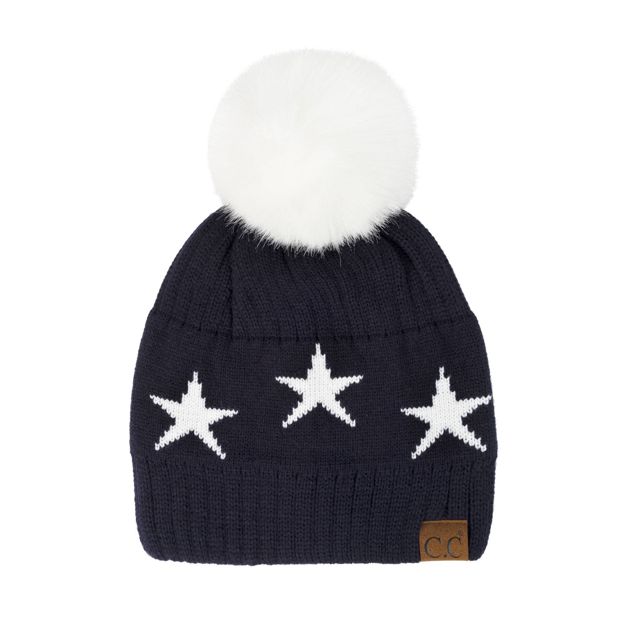 CC Beanie featuring a luxurious faux fur pom and trendy star pattern, perfect for stylish winter wear.