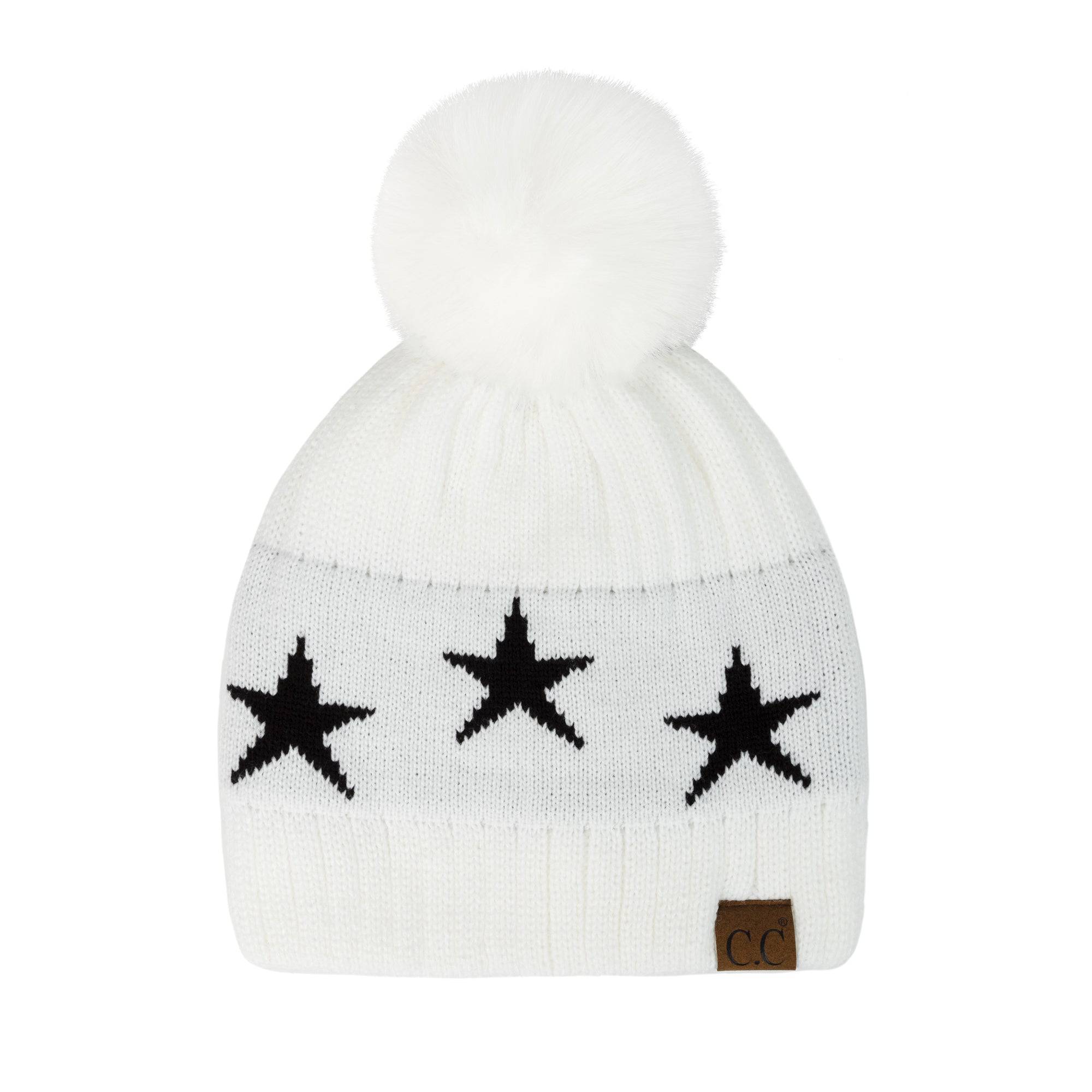 CC Beanie featuring a luxurious faux fur pom and trendy star pattern, perfect for stylish winter wear.
