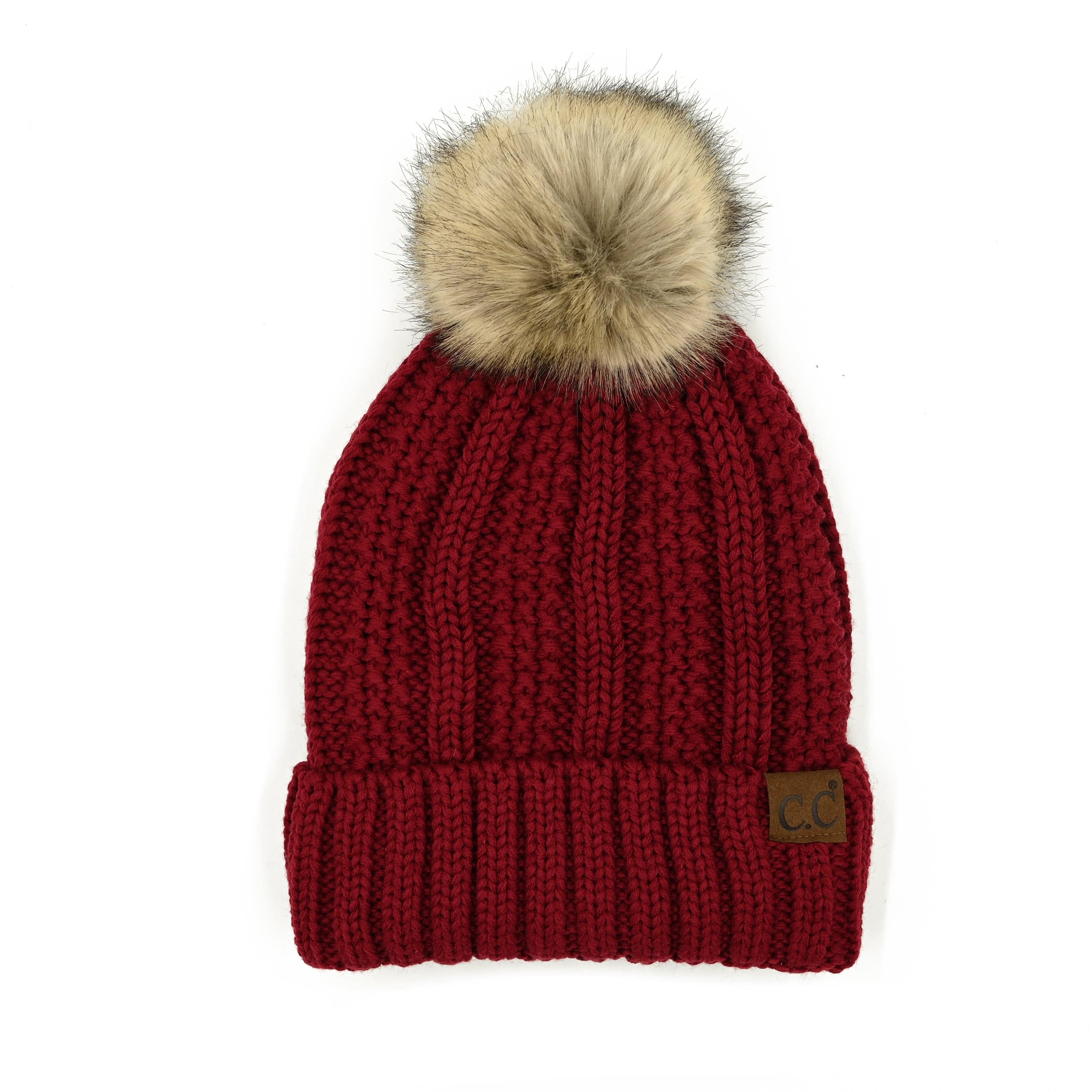 CC Bold Pom Accented Beanie with faux fur pom, cozy fleece lining, and authentic C.C.® branding, suitable for kids and adults.