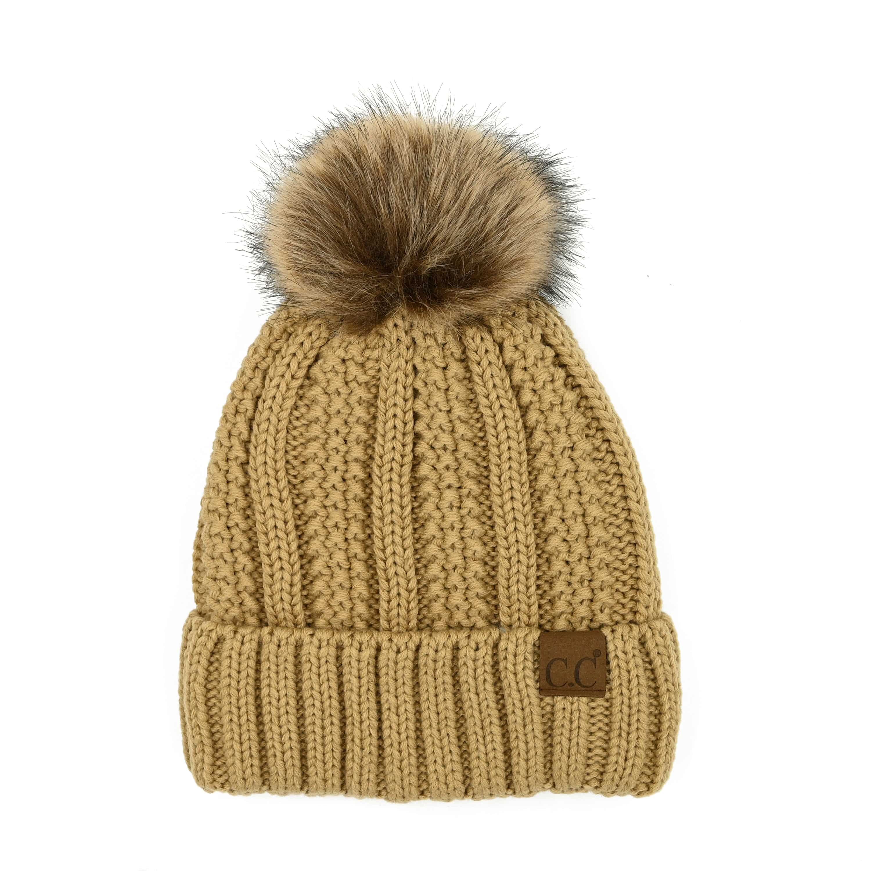 CC Bold Pom Accented Beanie with faux fur pom, cozy fleece lining, and authentic C.C.® branding, suitable for kids and adults.
