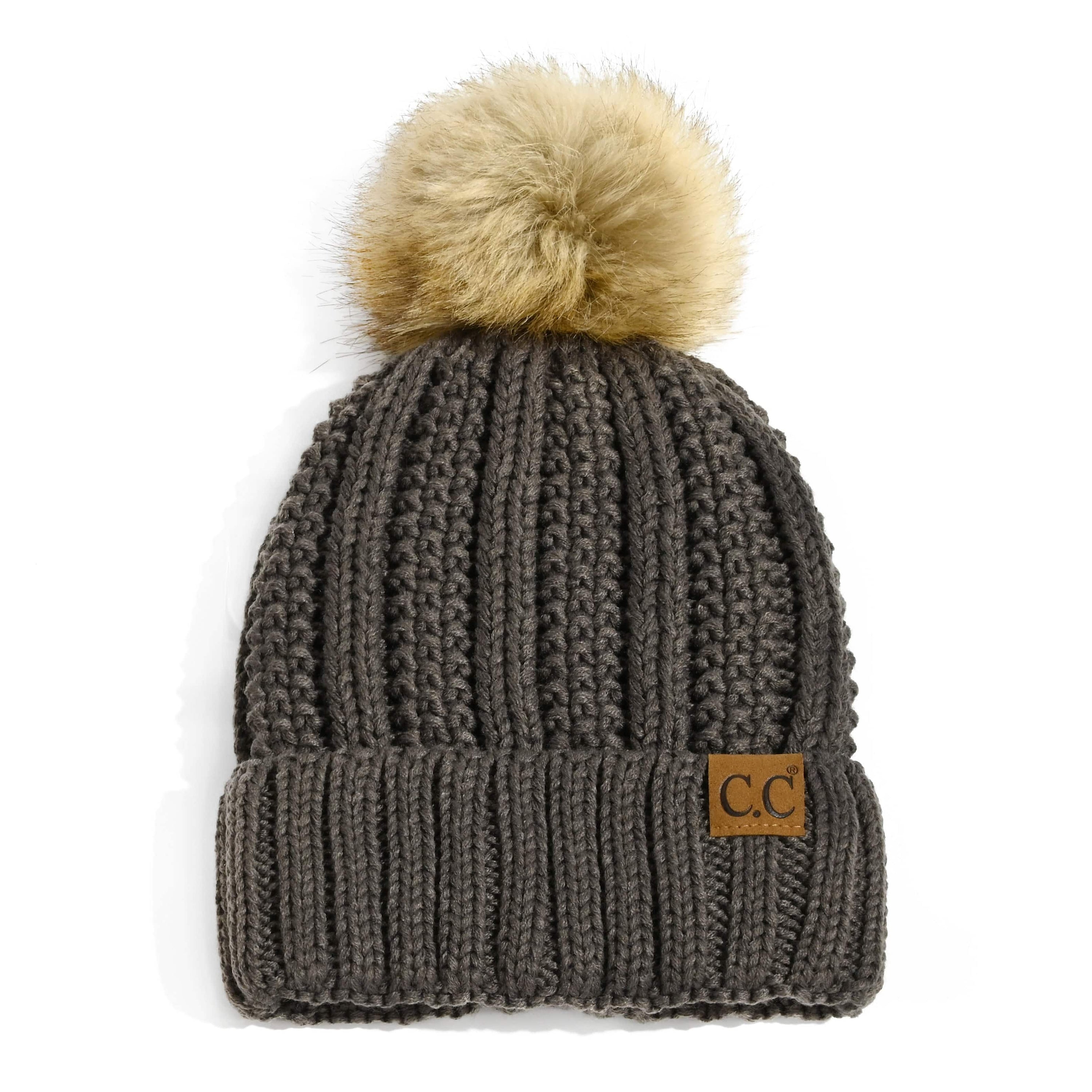 CC Bold Pom Accented Beanie with faux fur pom, cozy fleece lining, and authentic C.C.® branding, suitable for kids and adults.