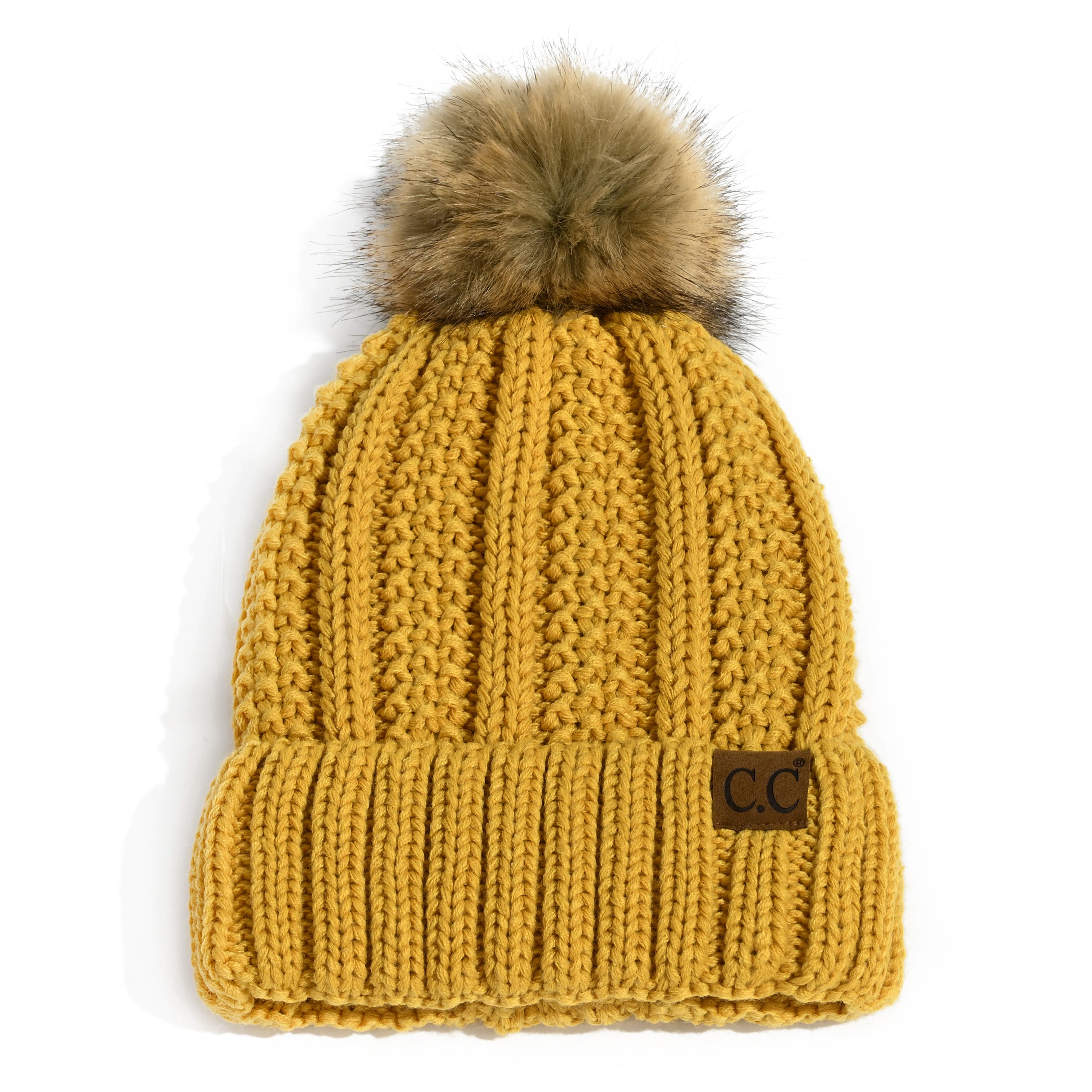 CC Bold Pom Accented Beanie with faux fur pom, cozy fleece lining, and authentic C.C.® branding, suitable for kids and adults.