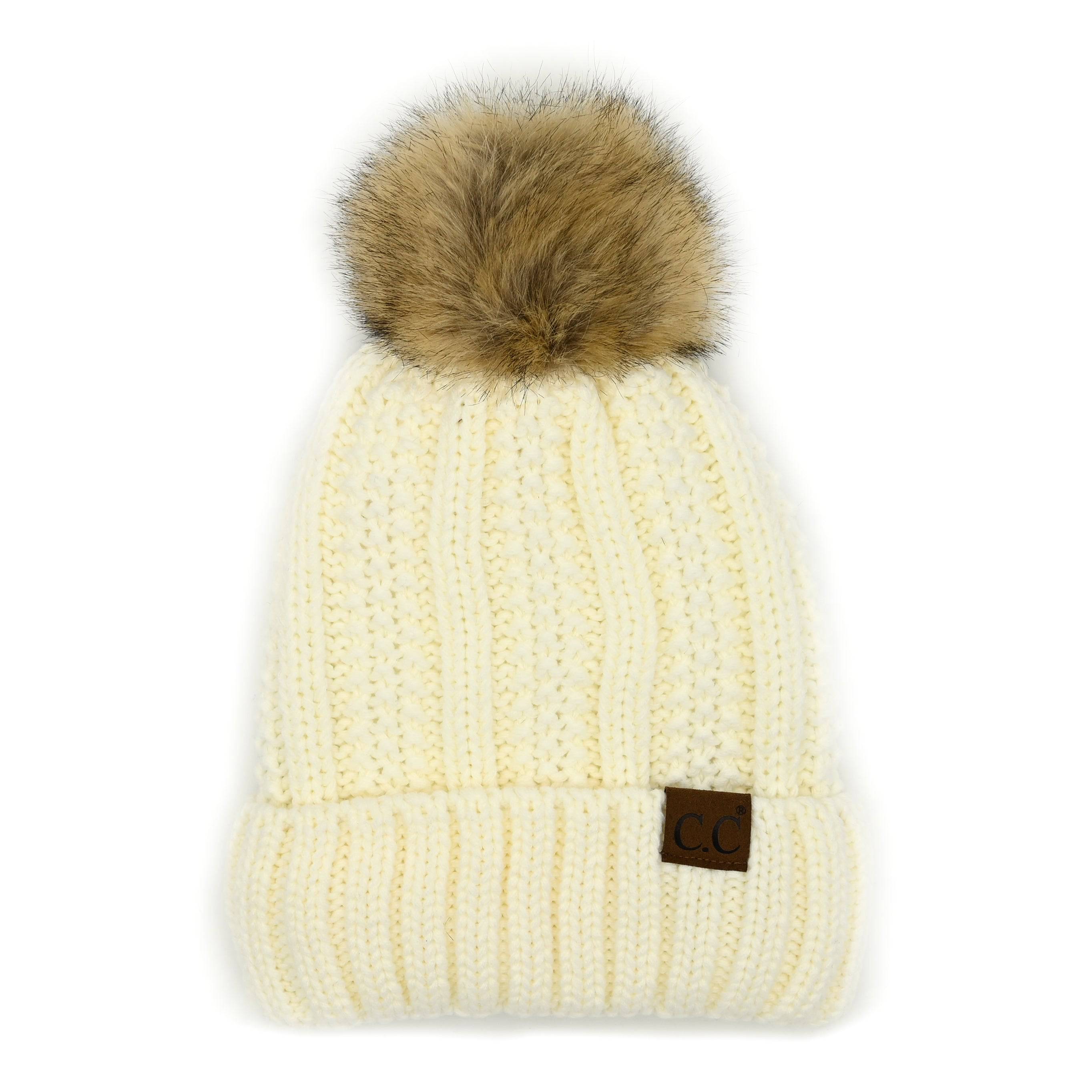 CC Bold Pom Accented Beanie with faux fur pom, cozy fleece lining, and authentic C.C.® branding, suitable for kids and adults.