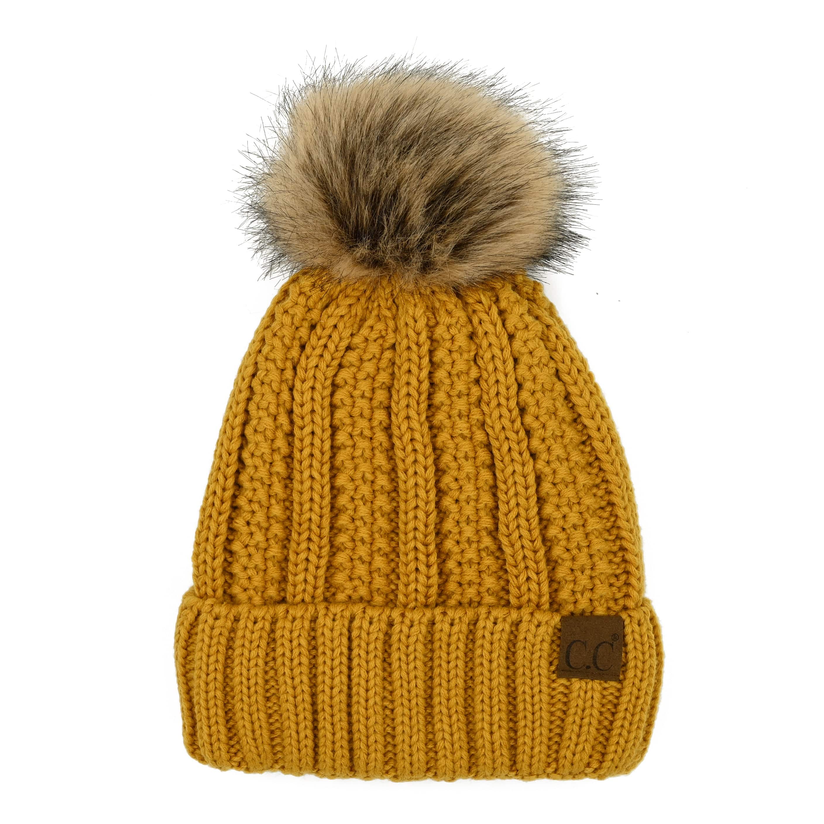 CC Bold Pom Accented Beanie with faux fur pom, cozy fleece lining, and authentic C.C.® branding, suitable for kids and adults.