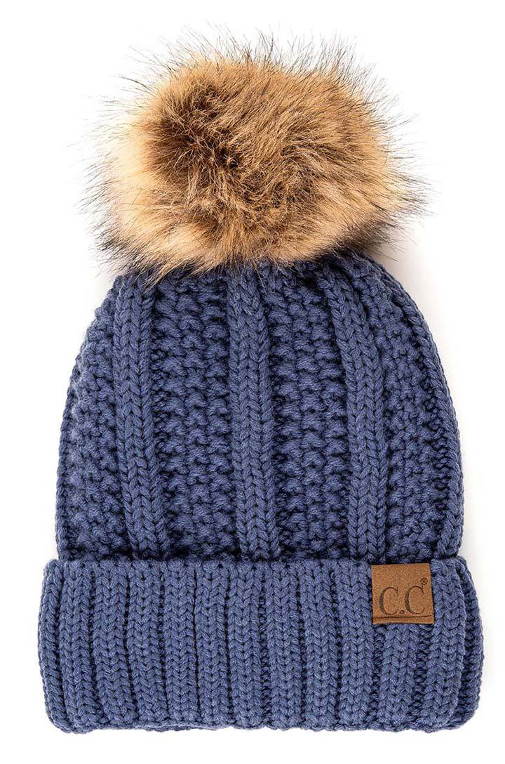 CC Bold Pom Accented Beanie with faux fur pom, cozy fleece lining, and authentic C.C.® branding, suitable for kids and adults.