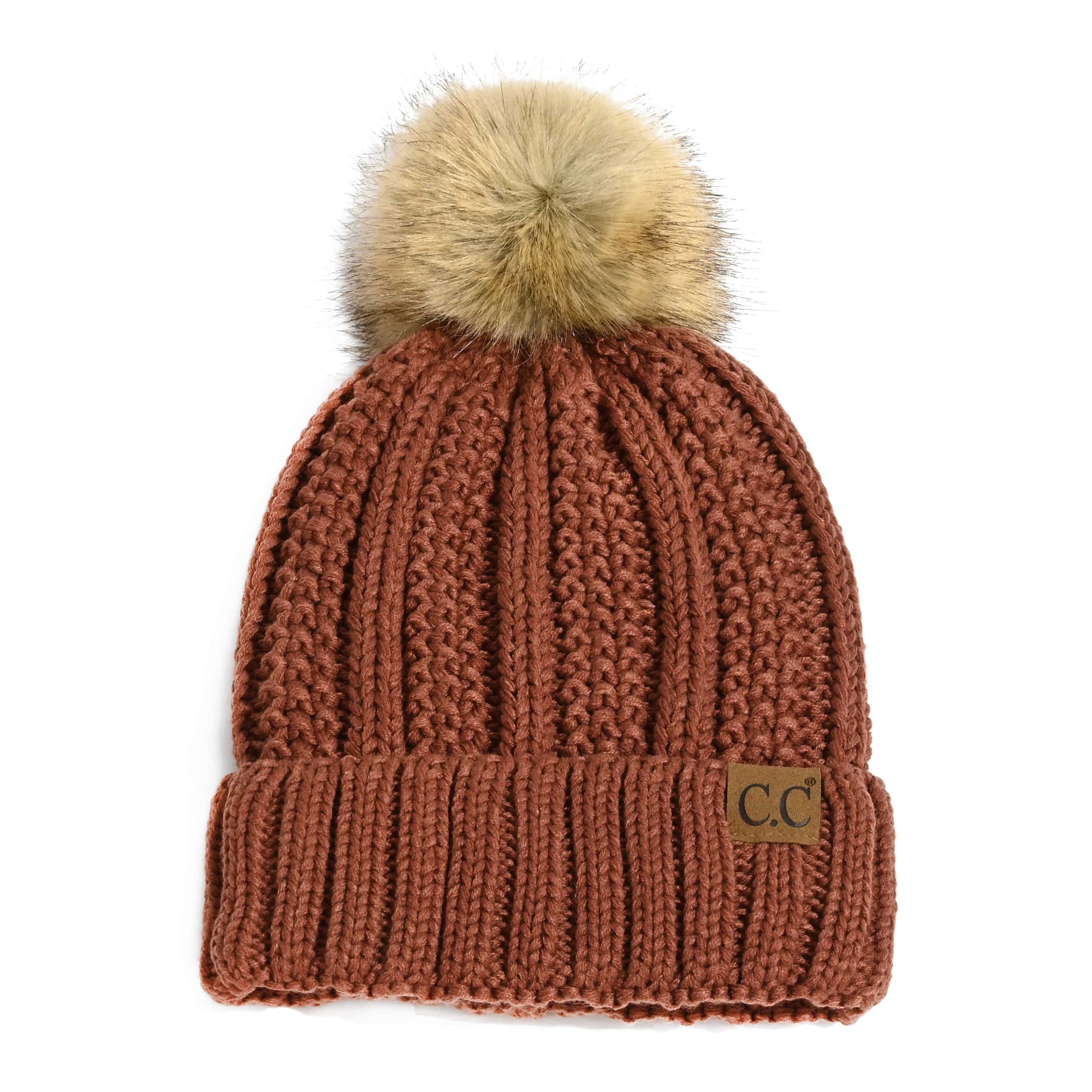 CC Bold Pom Accented Beanie with faux fur pom, cozy fleece lining, and authentic C.C.® branding, suitable for kids and adults.