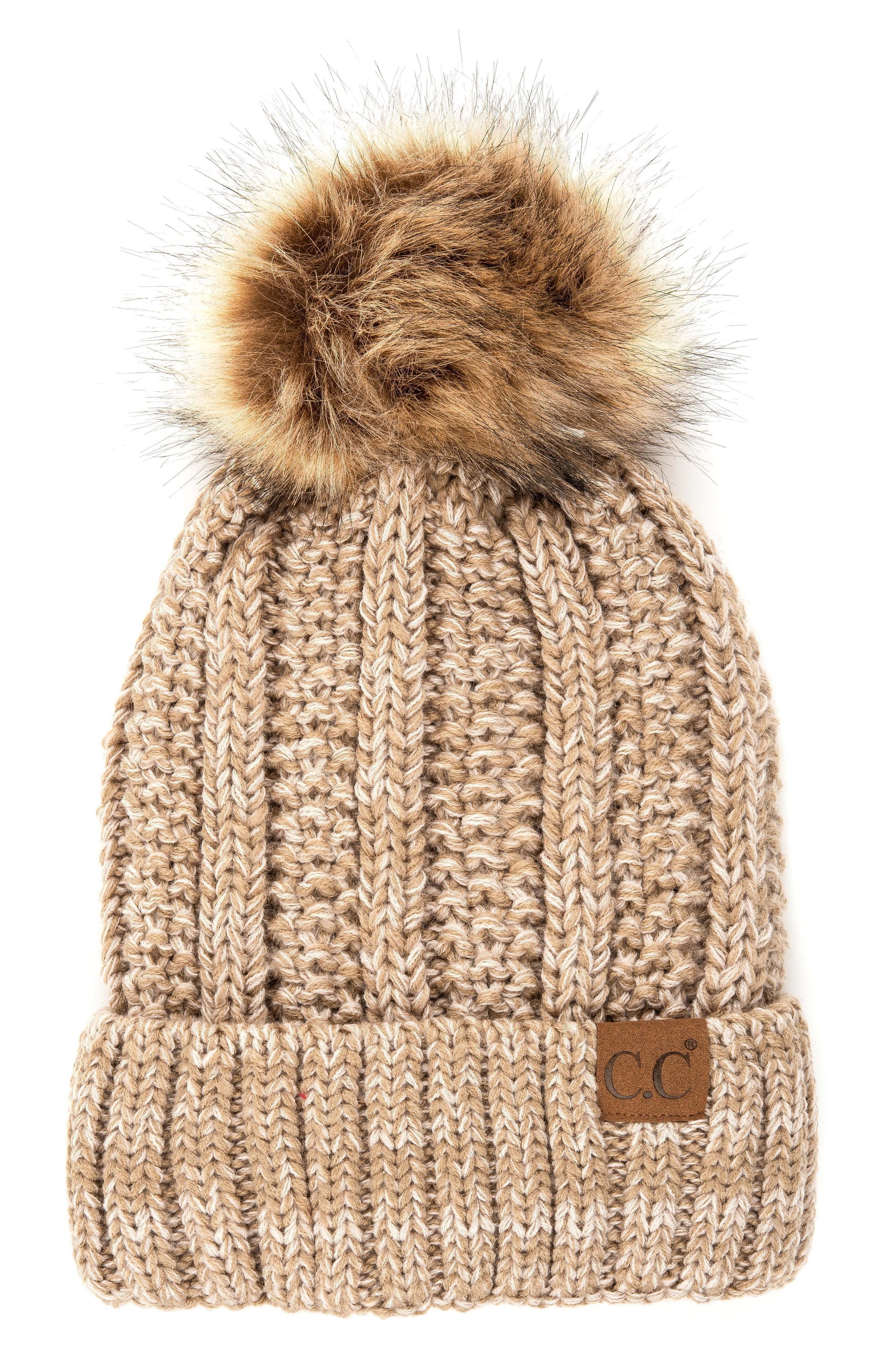 CC Bold Pom Accented Beanie with faux fur pom, cozy fleece lining, and authentic C.C.® branding, suitable for kids and adults.