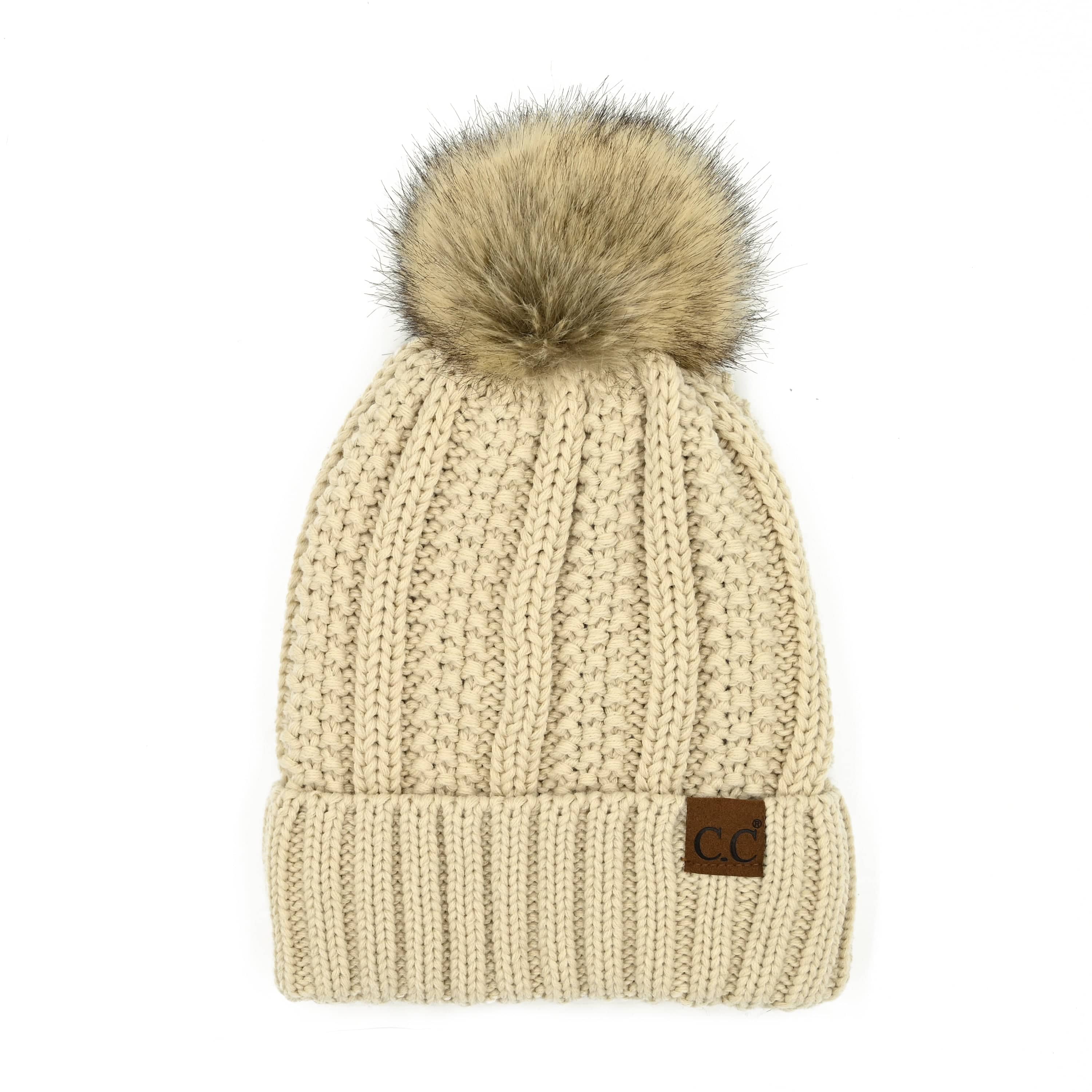 CC Bold Pom Accented Beanie with faux fur pom, cozy fleece lining, and authentic C.C.® branding, suitable for kids and adults.