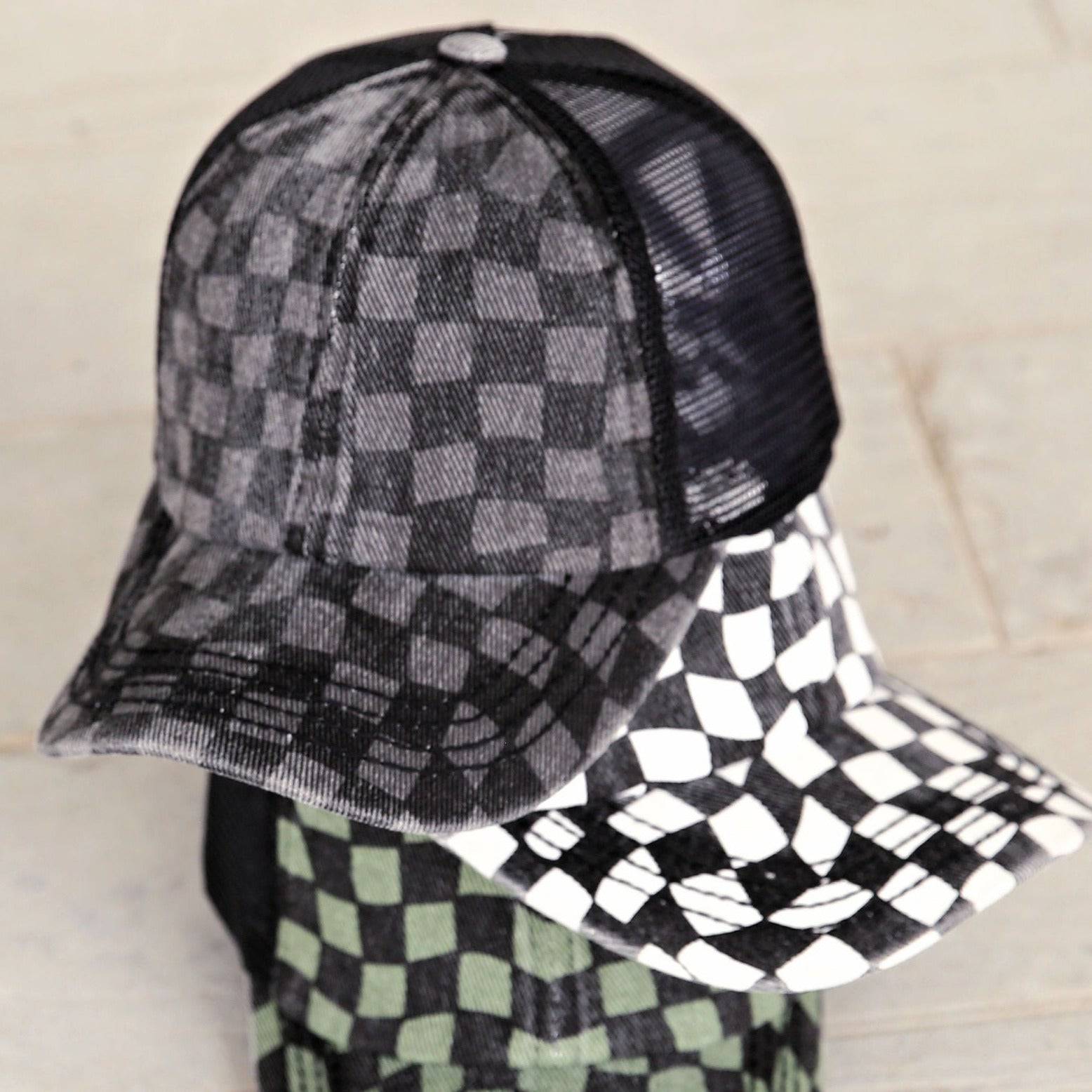 Stylish CC Checkered Pattern Pony Hat with breathable mesh back and criss-cross design for versatile hair styling.