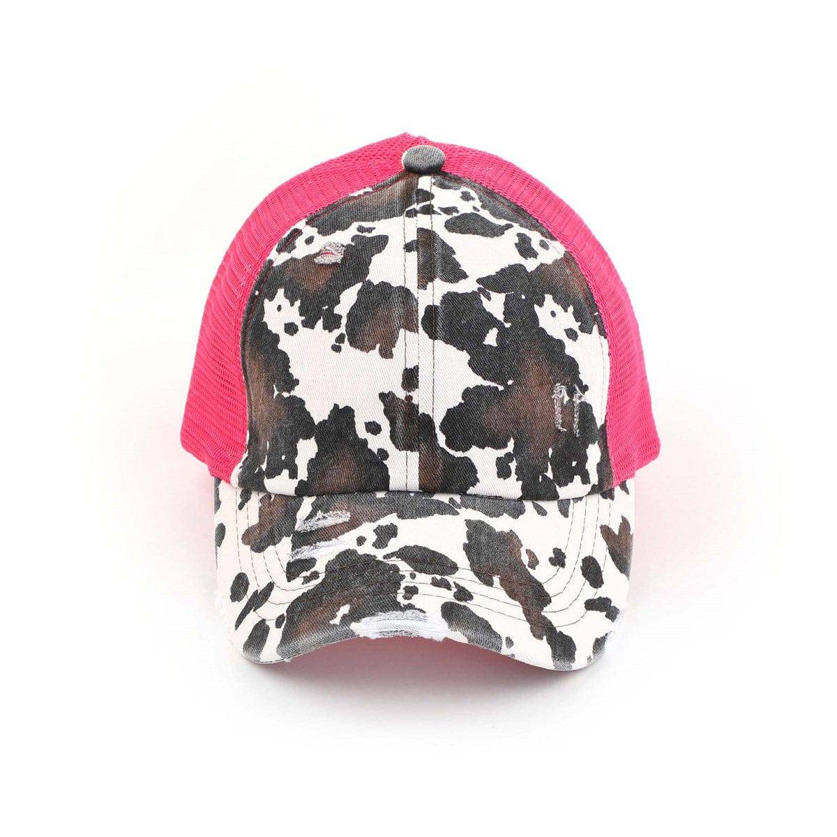 CC Cow Print Pony Hat featuring criss-cross elastic for ponytails, soft cotton material, and adjustable velcro strap.
