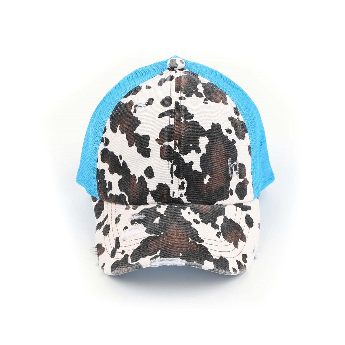 CC Cow Print Pony Hat featuring criss-cross elastic for ponytails, soft cotton material, and adjustable velcro strap.