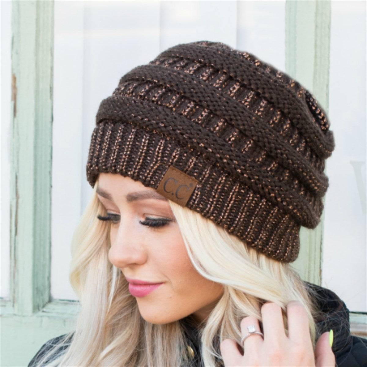 CC Cozy Metallic Cable Knit Skully Beanie in various trending colors with a stylish cable knit pattern and metallic accents.