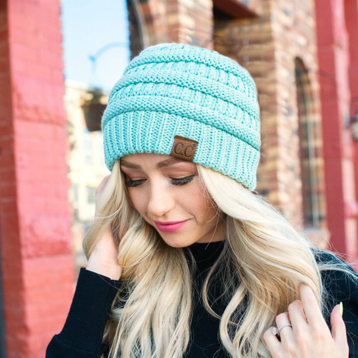 CC Cozy Metallic Cable Knit Skully Beanie in various trending colors with a stylish cable knit pattern and metallic accents.