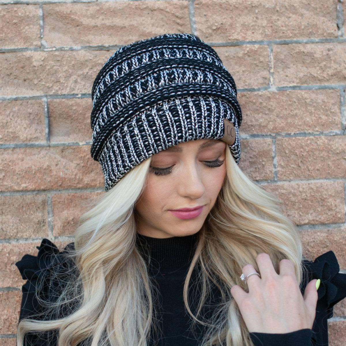 CC Cozy Metallic Cable Knit Skully Beanie in various trending colors with a stylish cable knit pattern and metallic accents.