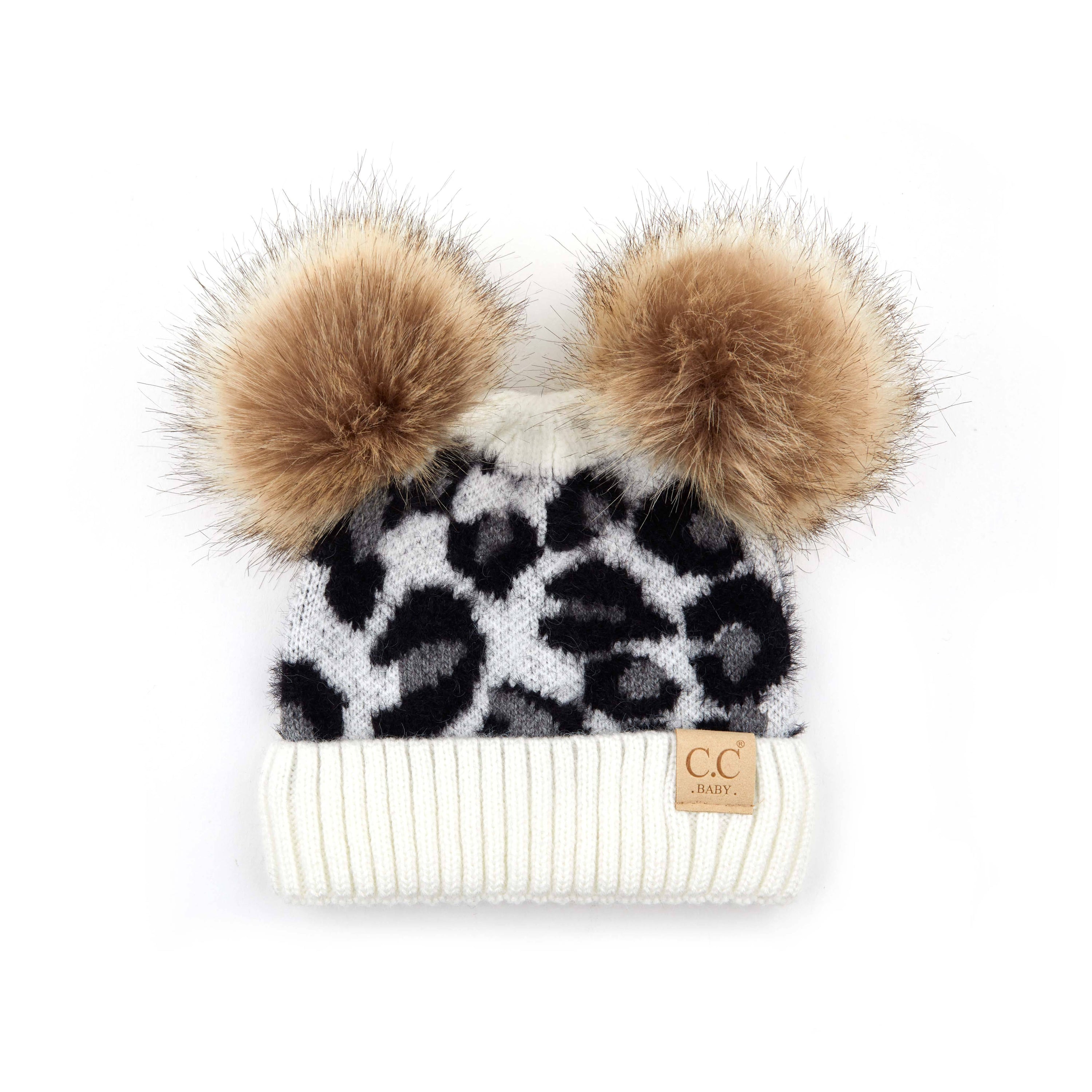 CC Double Pom Baby & Kids Leopard Beanie with fluffy faux fur poms and stylish leopard print design, perfect for keeping kids warm.