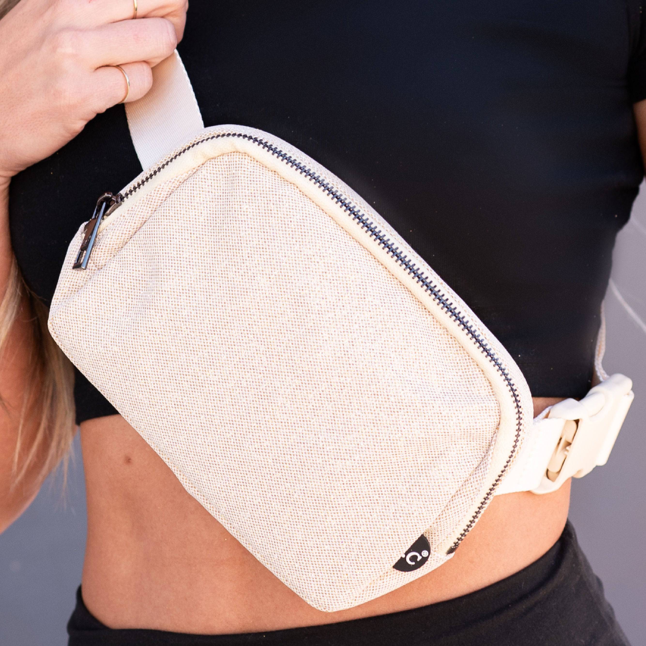 CC Glitter Belt Bag in sparkling design with adjustable strap and multiple pockets, perfect for stylish convenience.