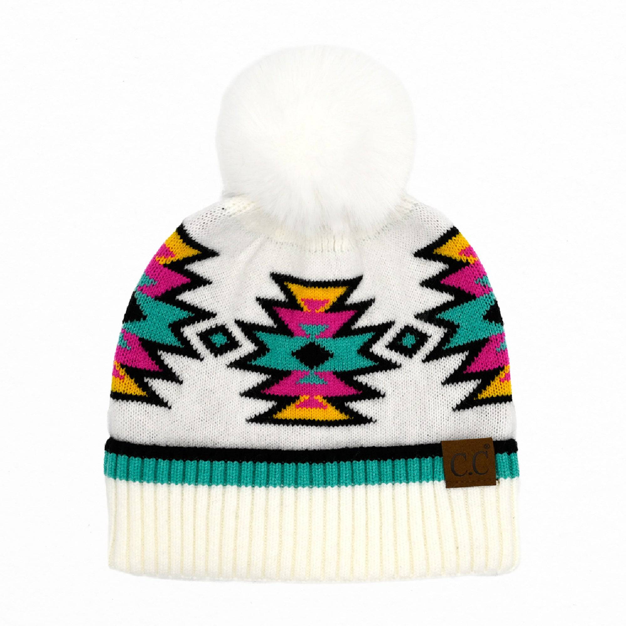 CC Kids South Western Pattern Faux Fur Pom Beanie featuring a vibrant design and a fluffy 4.5-inch faux fur pom.