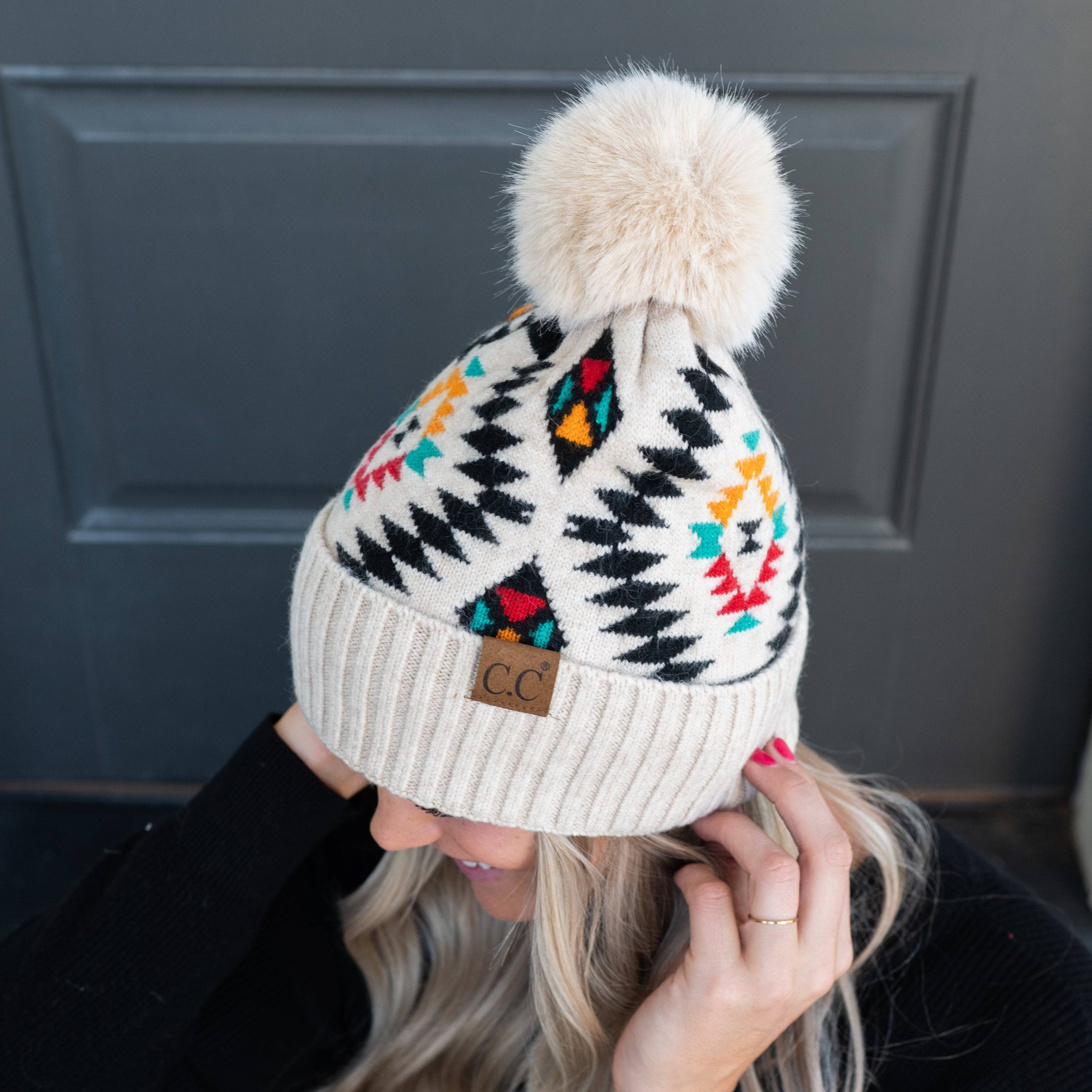 CC South Western Print Beanie with faux fur pom and Aztec pattern, perfect for winter fashion.