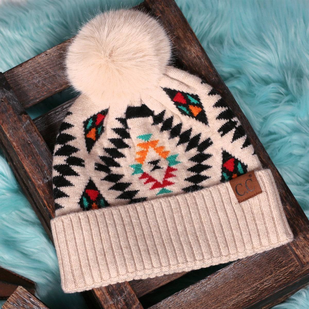 CC South Western Print Beanie with faux fur pom and Aztec pattern, perfect for winter fashion.