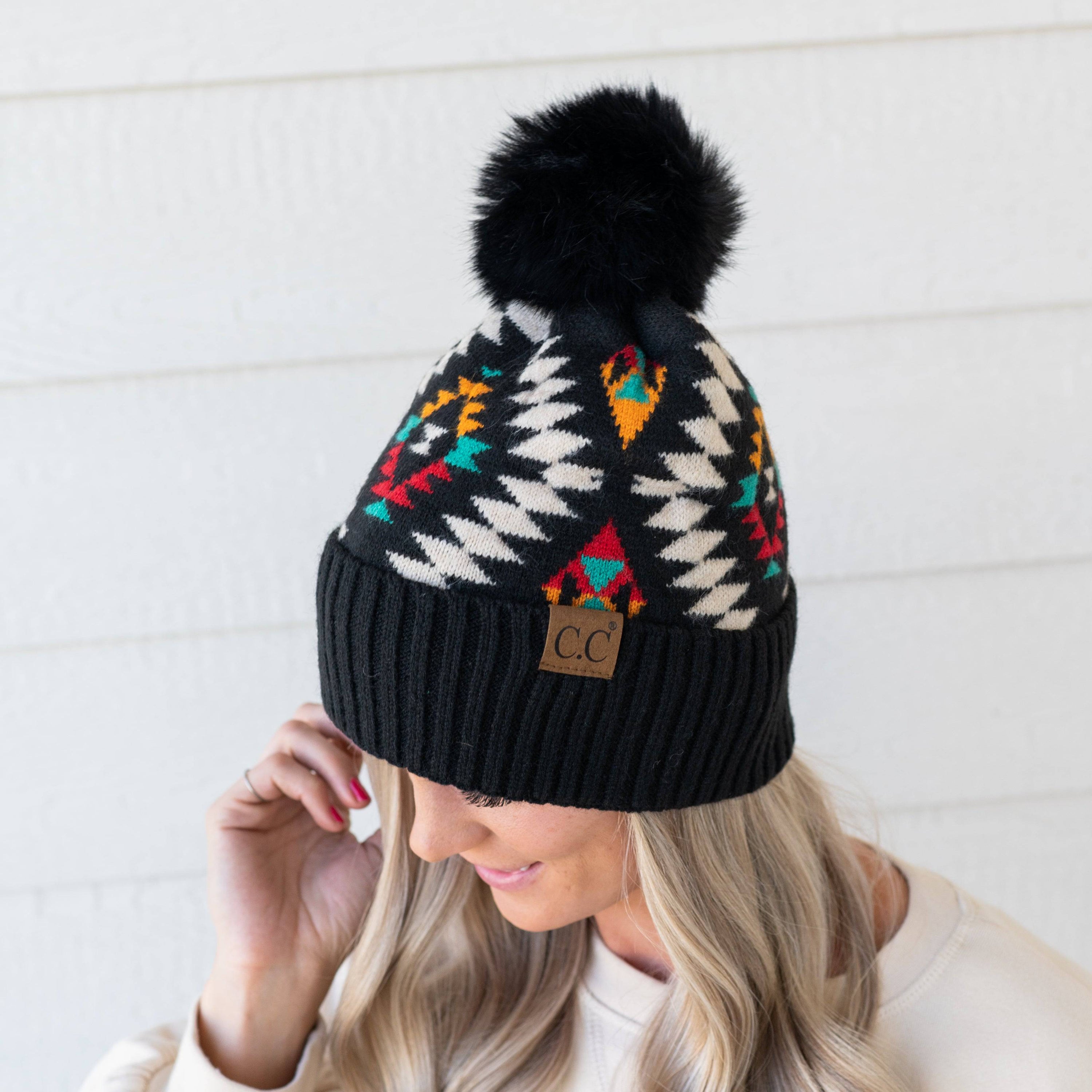 CC South Western Print Kids Beanie Hat with Faux Fur Pom, featuring a colorful Aztec design and quality knitted fabric.