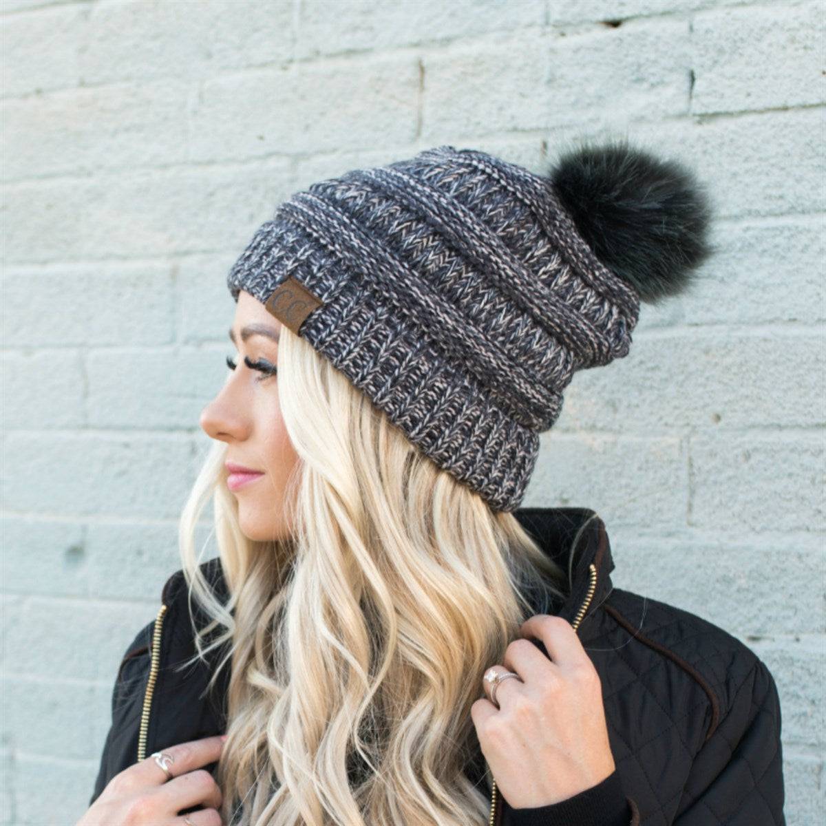 CC Trending 4-Tone Beanie with Tan Pom Pom, showcasing stylish multi-color yarn and fluffy faux fur pom.