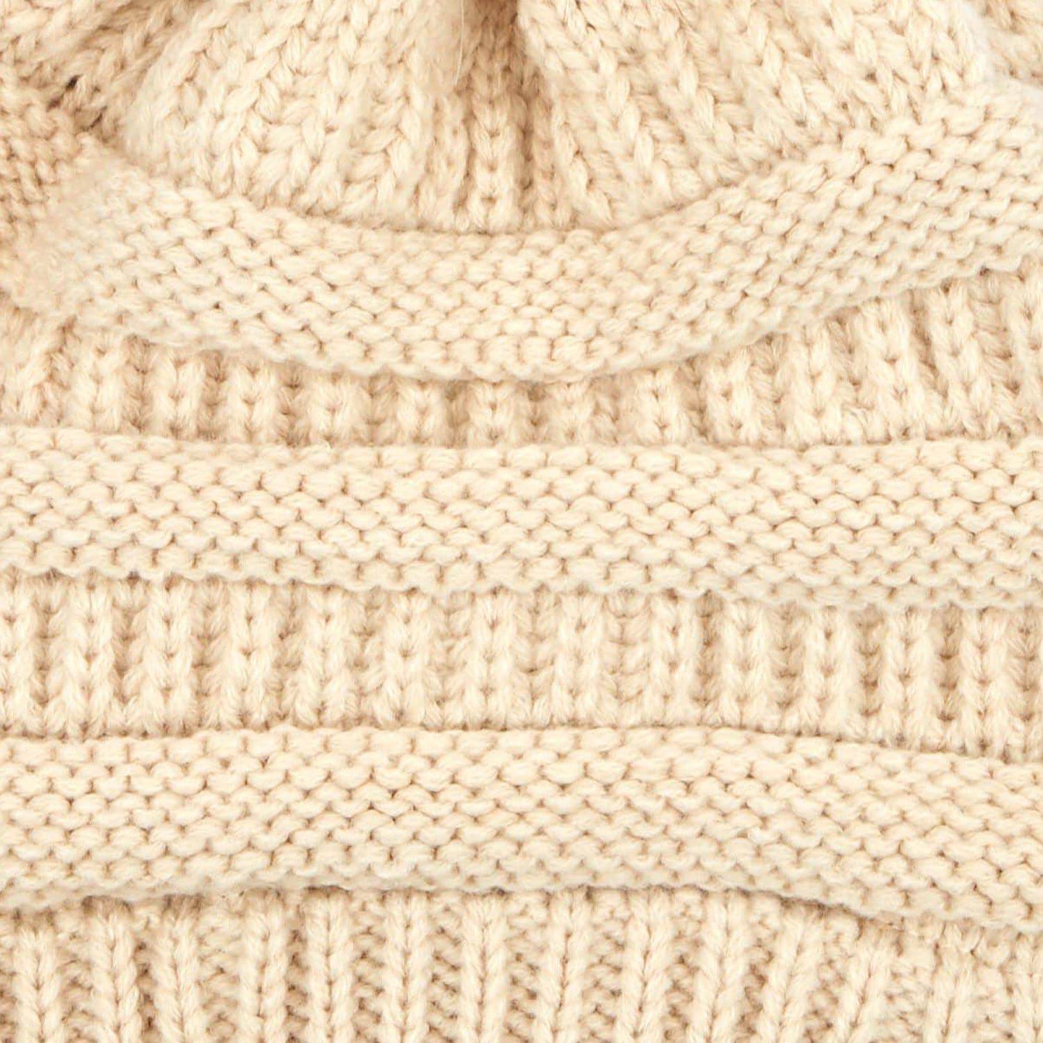 CC Trending Pom Beanie in school spirit colors with a cozy cable knit texture and matching faux fur pom.