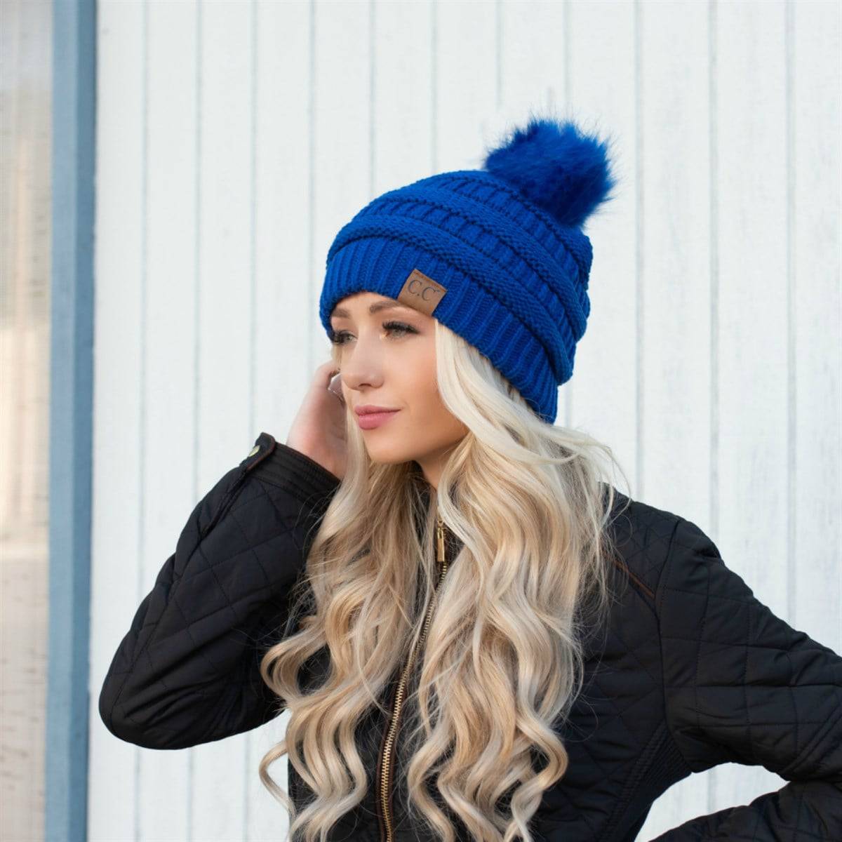 CC Trending Pom Beanie in school spirit colors with a cozy cable knit texture and matching faux fur pom.