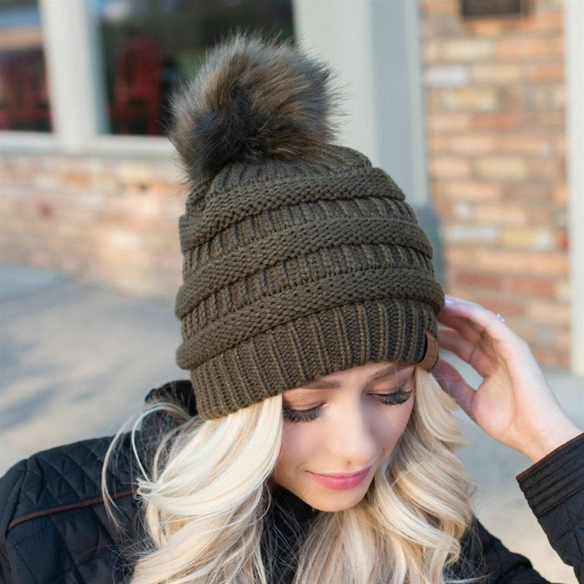 CC Trending Pom Beanie in school spirit colors with a cozy cable knit texture and matching faux fur pom.