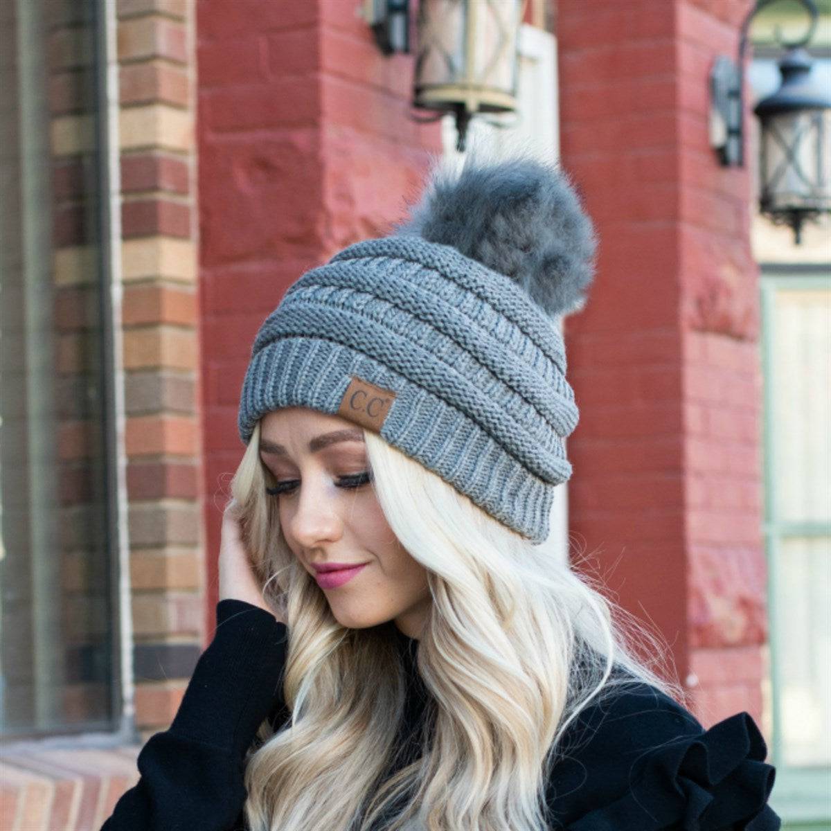 CC Trending Pom Beanie in school spirit colors with a cozy cable knit texture and matching faux fur pom.