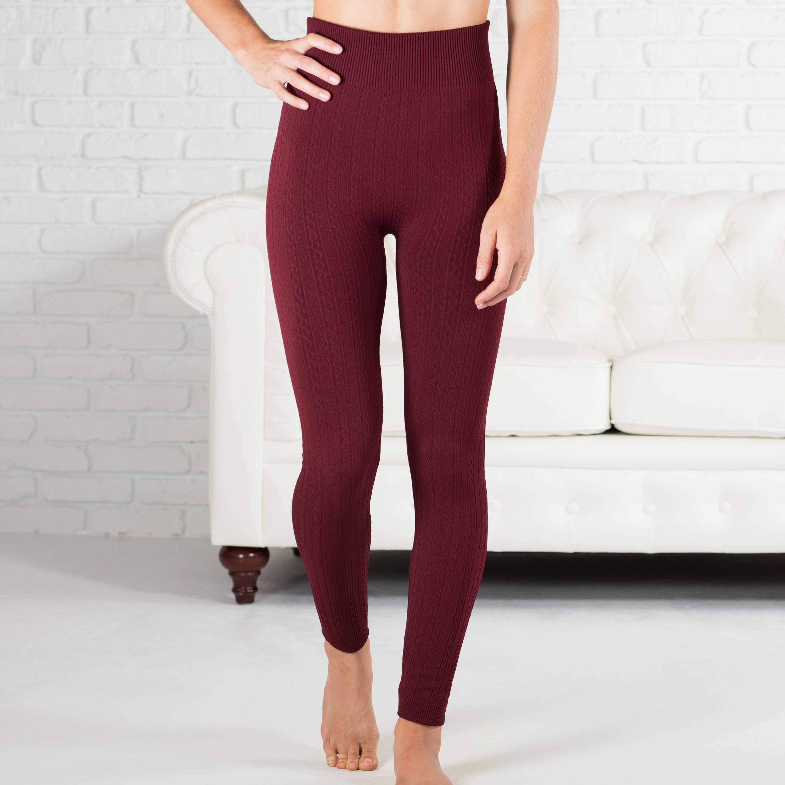 Cozy cable knit fleece lined leggings in a stylish design, perfect for comfort and warmth.
