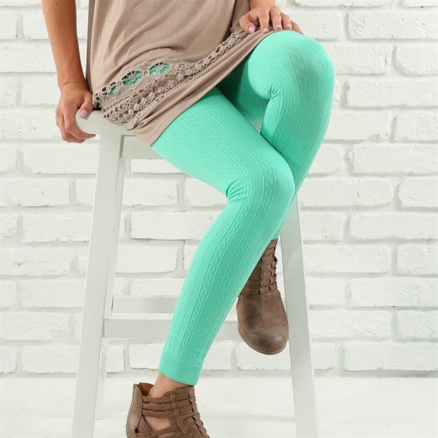 Cozy cable knit fleece lined leggings in a stylish design, perfect for comfort and warmth.