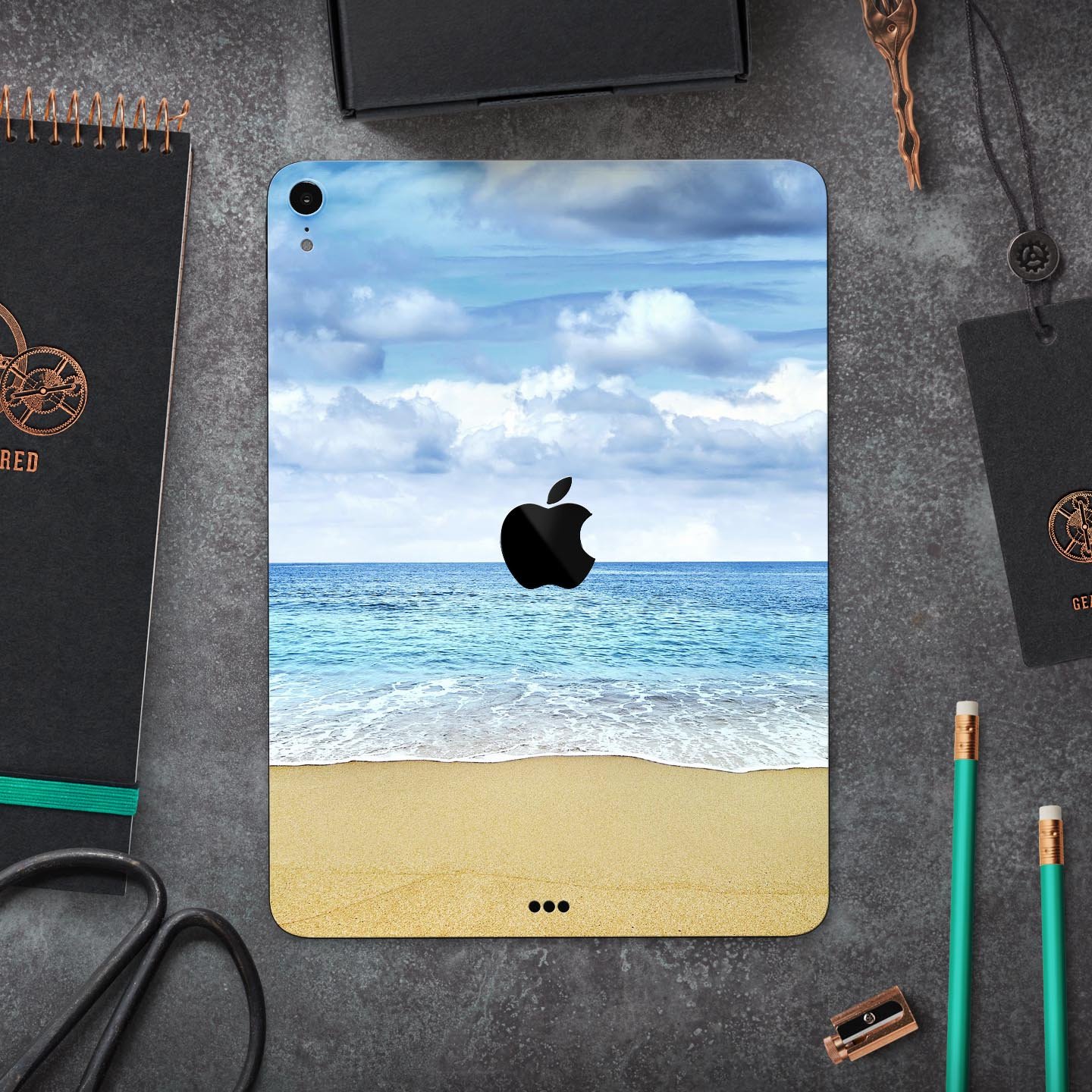 Calm Blue Sky and Sea Shore skin decal for Apple iPad, showcasing a serene beach scene with vibrant colors and a sleek design.