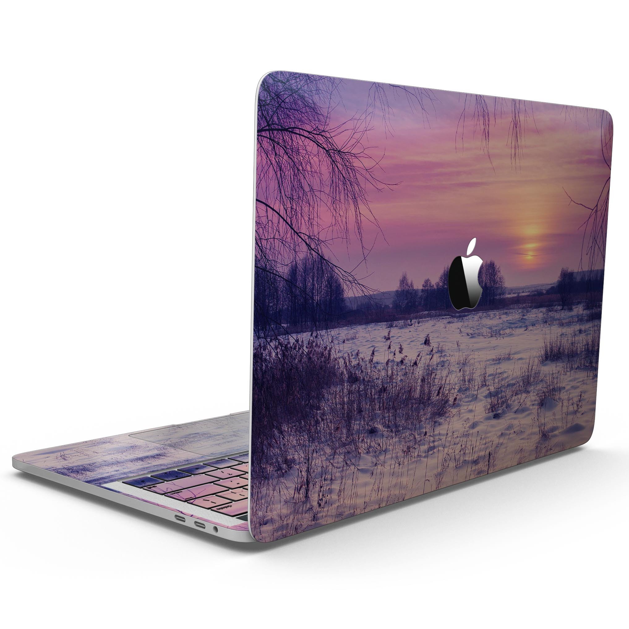 Calm Snowy Sunset skin kit for MacBook Pro with Touch Bar, showcasing a beautiful snowy landscape design on premium vinyl.