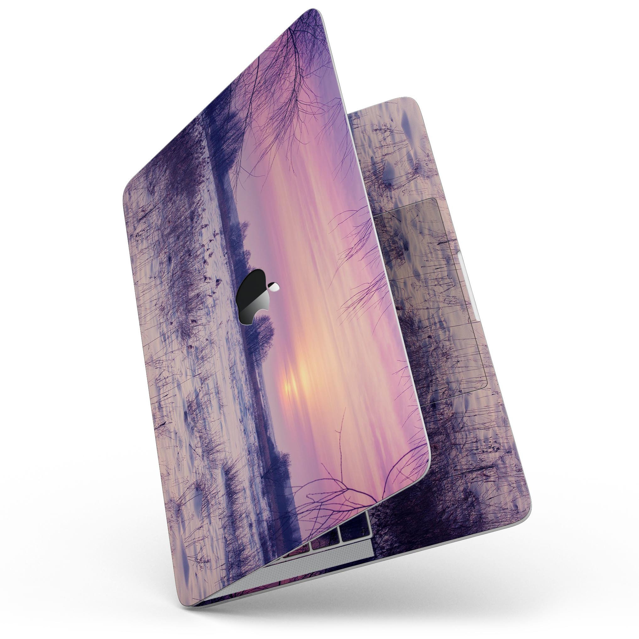 Calm Snowy Sunset skin kit for MacBook Pro with Touch Bar, showcasing a beautiful snowy landscape design on premium vinyl.