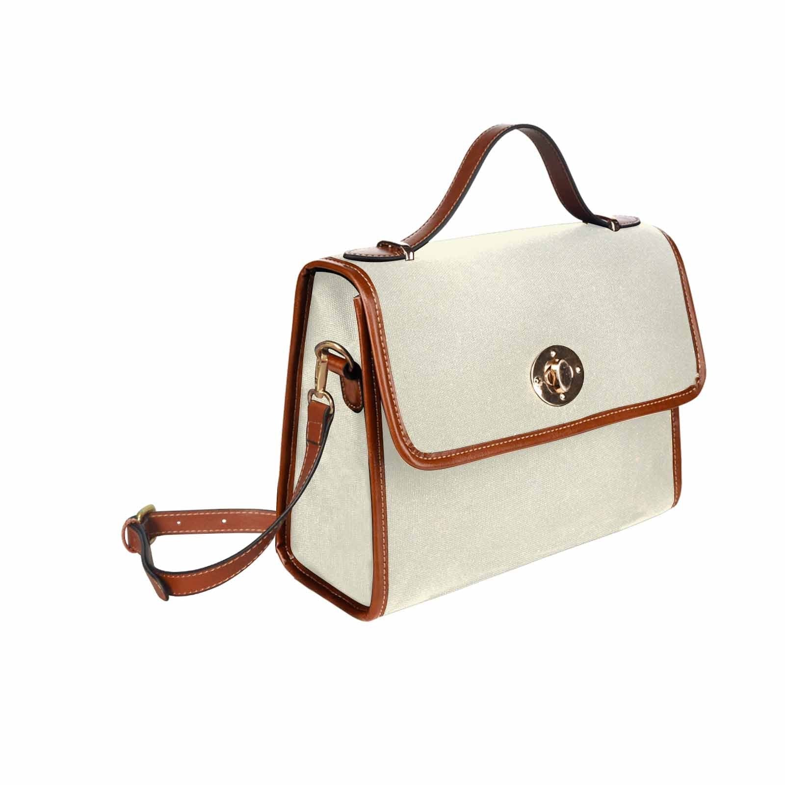 Beige waterproof canvas handbag with brown crossbody strap, featuring two interior pockets and a zipper pocket.