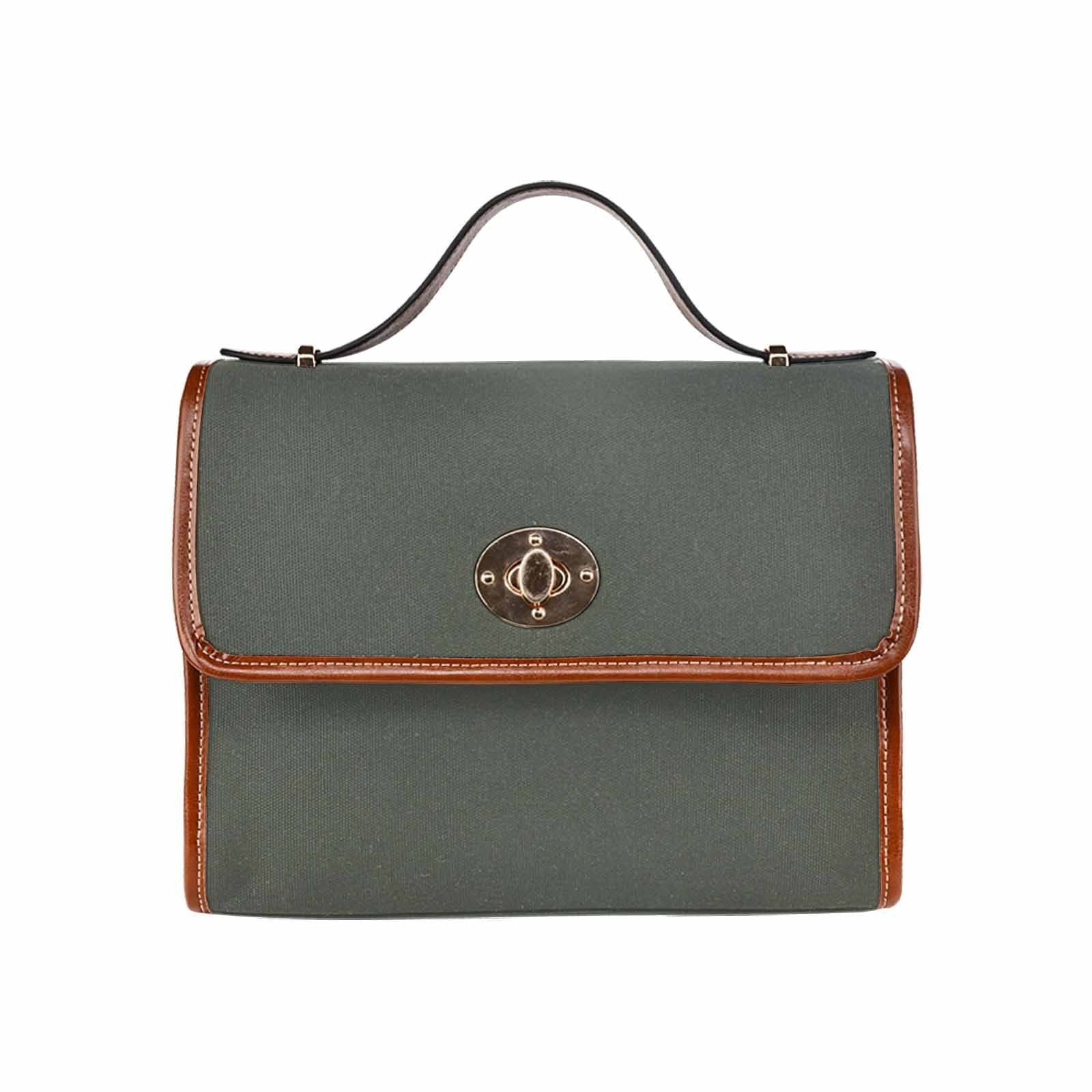 Stylish Canvas Handbag in Ebony Black with a brown crossbody strap, showcasing its waterproof material and spacious design.