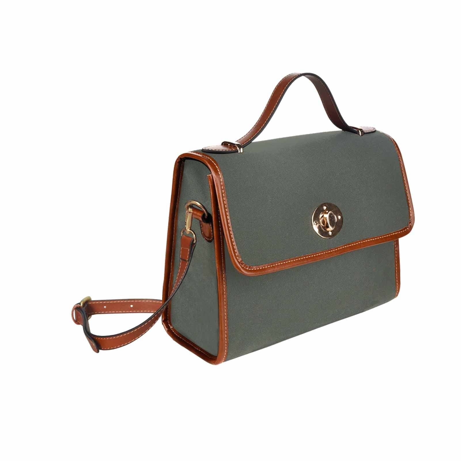 Stylish Canvas Handbag in Ebony Black with a brown crossbody strap, showcasing its waterproof material and spacious design.