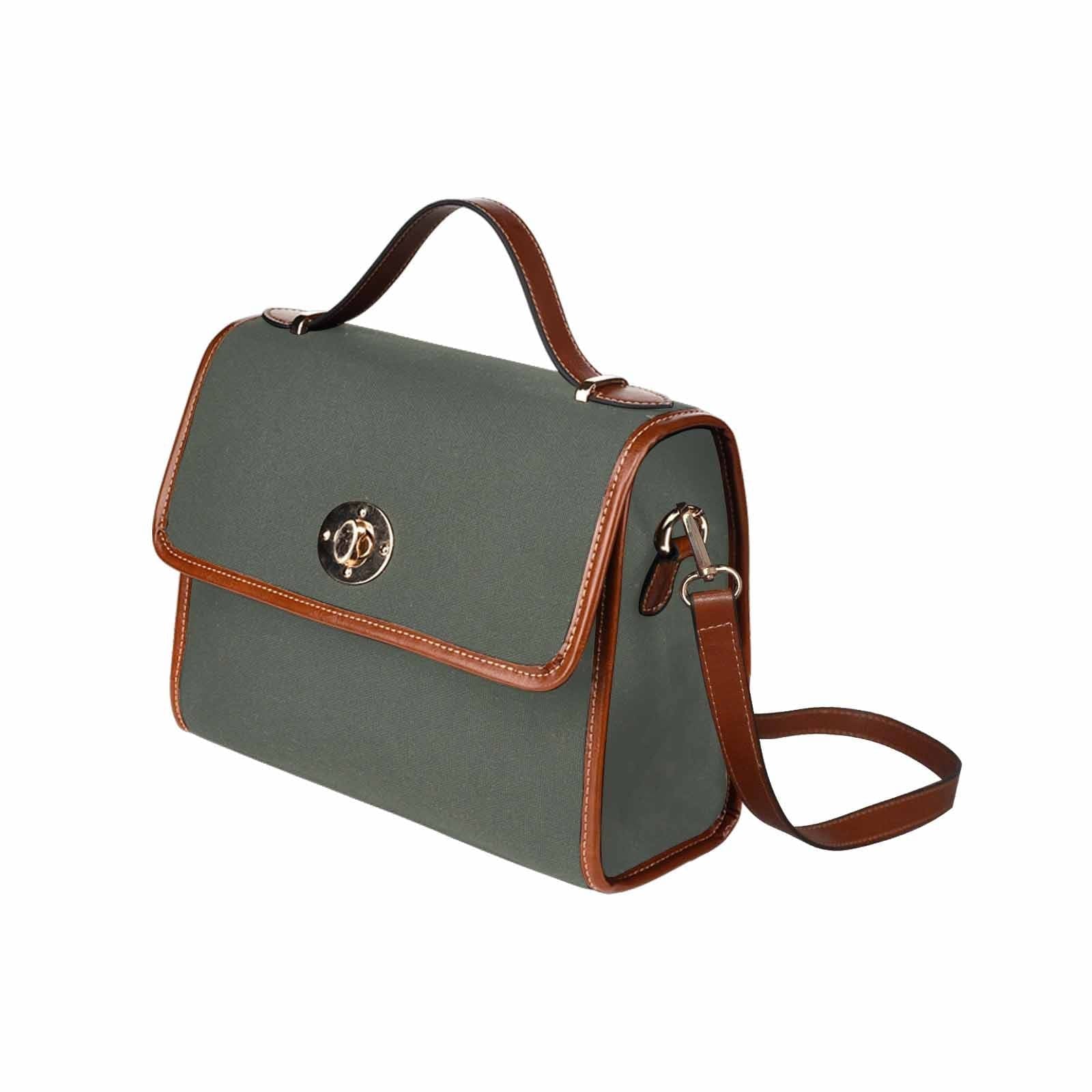 Stylish Canvas Handbag in Ebony Black with a brown crossbody strap, showcasing its waterproof material and spacious design.