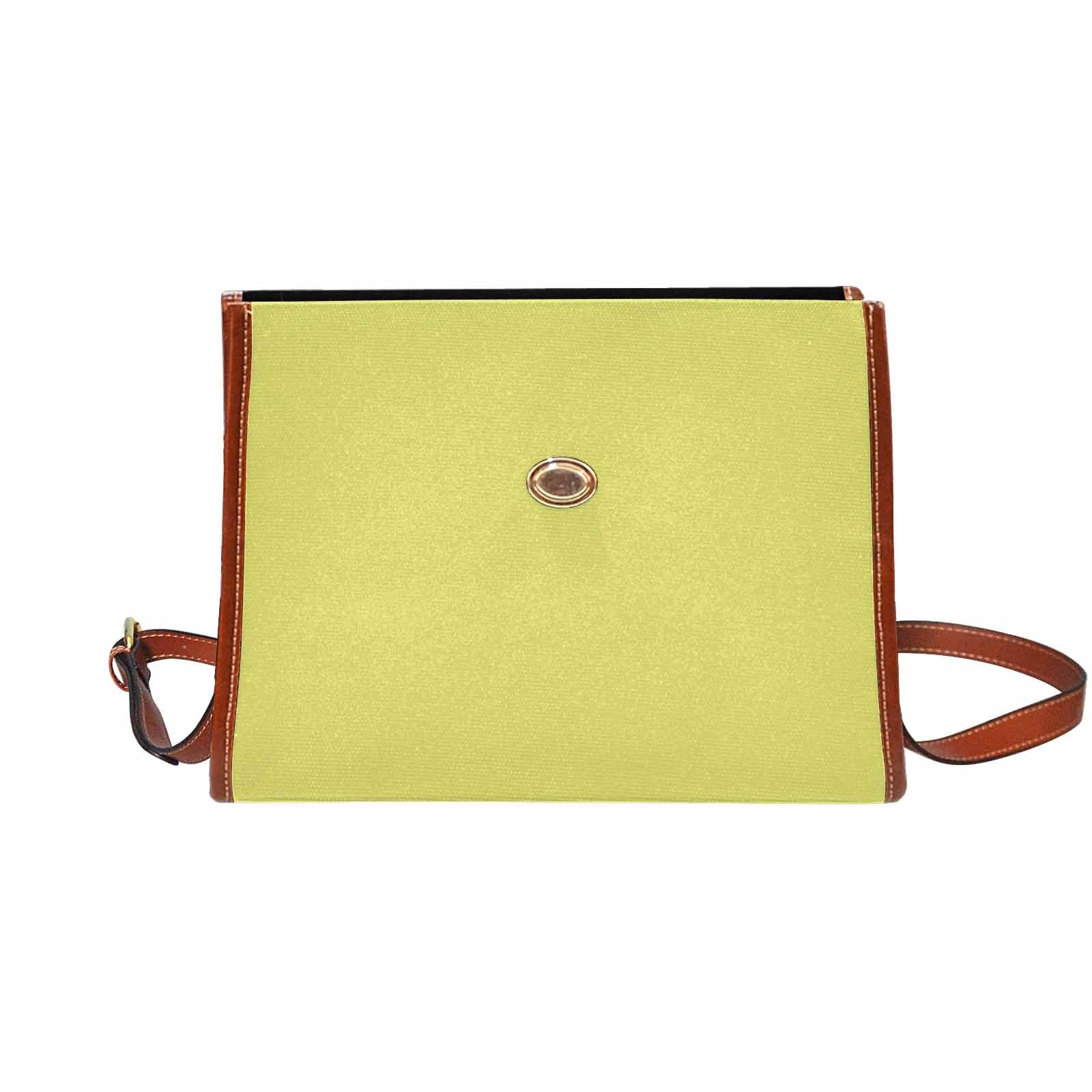 Stylish honeysuckle yellow canvas handbag with brown crossbody strap, featuring two interior pockets and a zipper pocket.