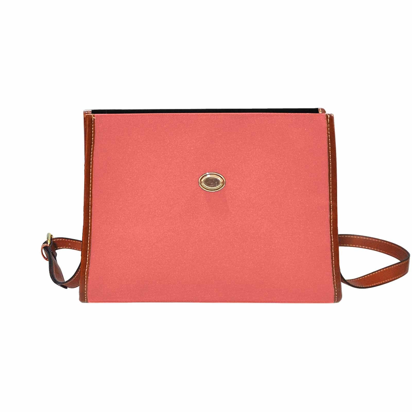 Pastel red waterproof canvas handbag with brown crossbody strap, featuring two interior pockets and a zipper pocket.