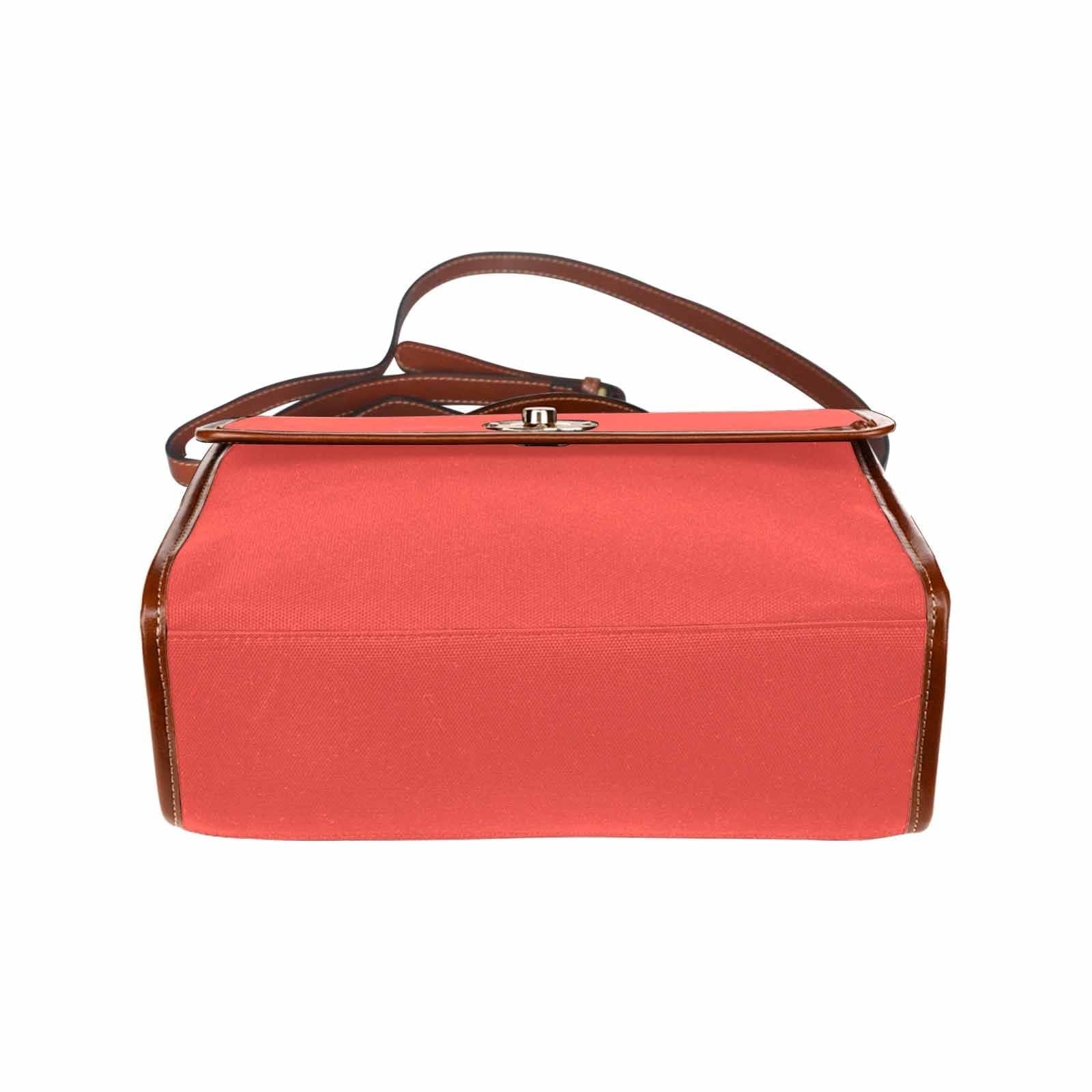 Red orange waterproof canvas handbag with brown crossbody strap, featuring two interior pockets and a zipper pocket.