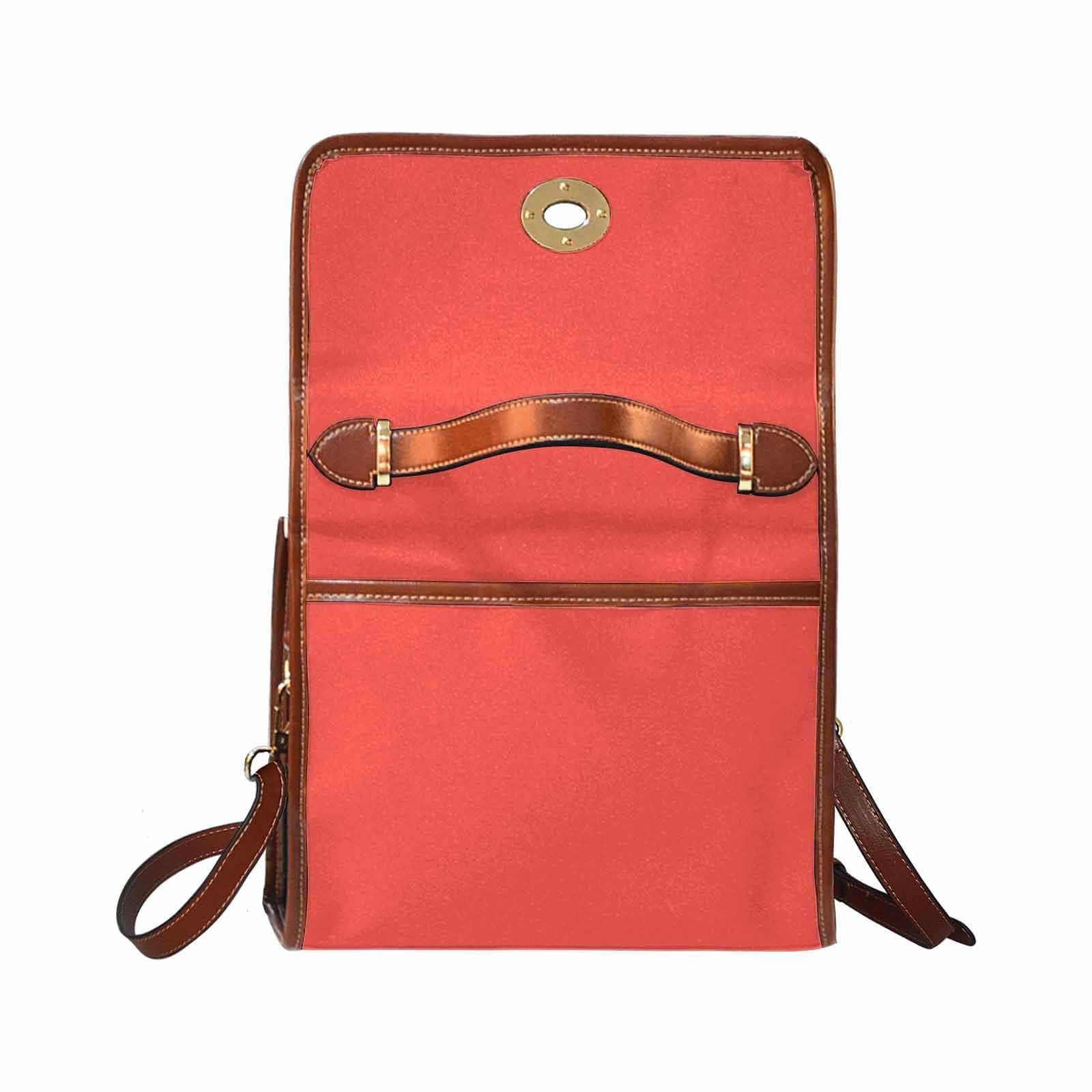 Red orange waterproof canvas handbag with brown crossbody strap, featuring two interior pockets and a zipper pocket.