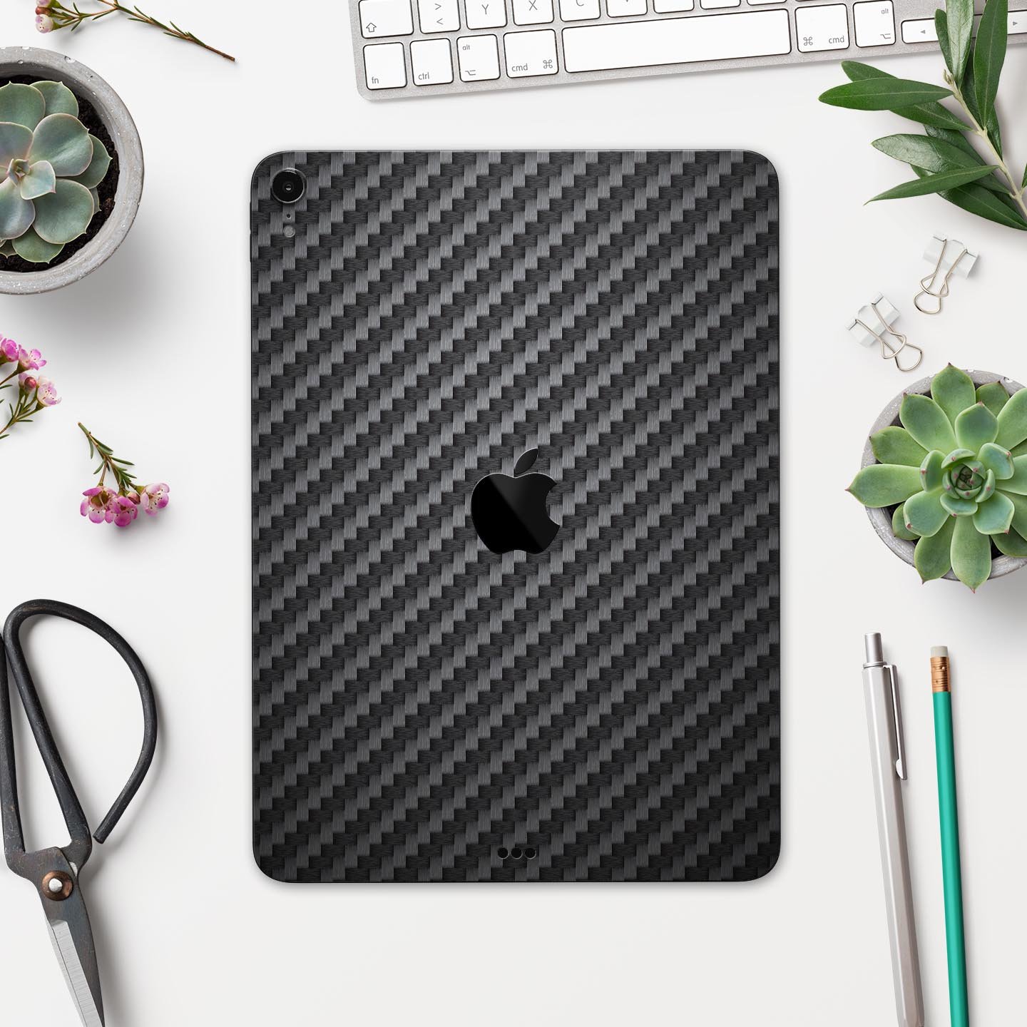 Carbon Fiber Texture Full Body Skin Decal for Apple iPad Pro, showcasing its sleek design and premium finish.