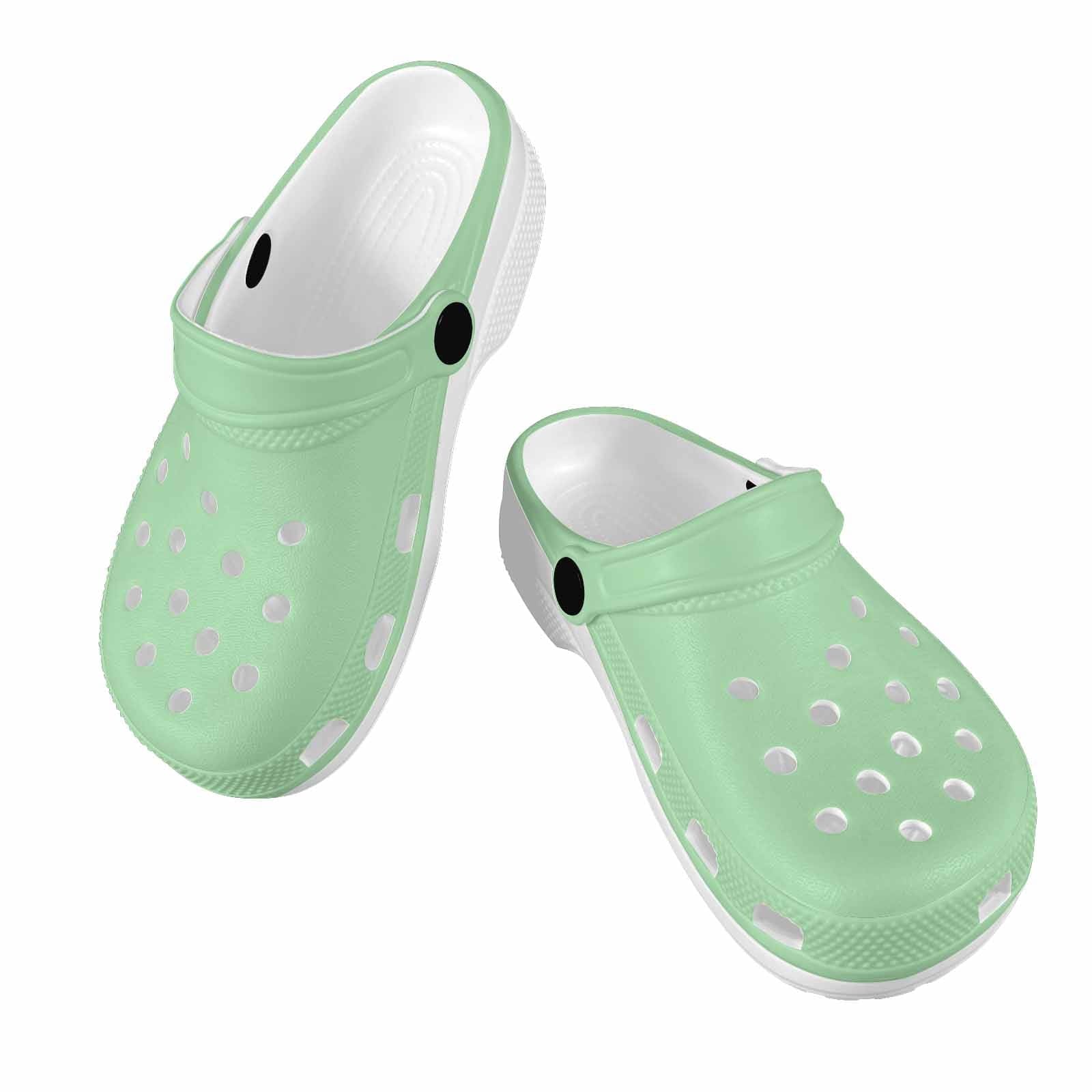 Celadon Green Clogs for Youth featuring a lightweight design, breathable material, and pivoting heel straps for a secure fit.