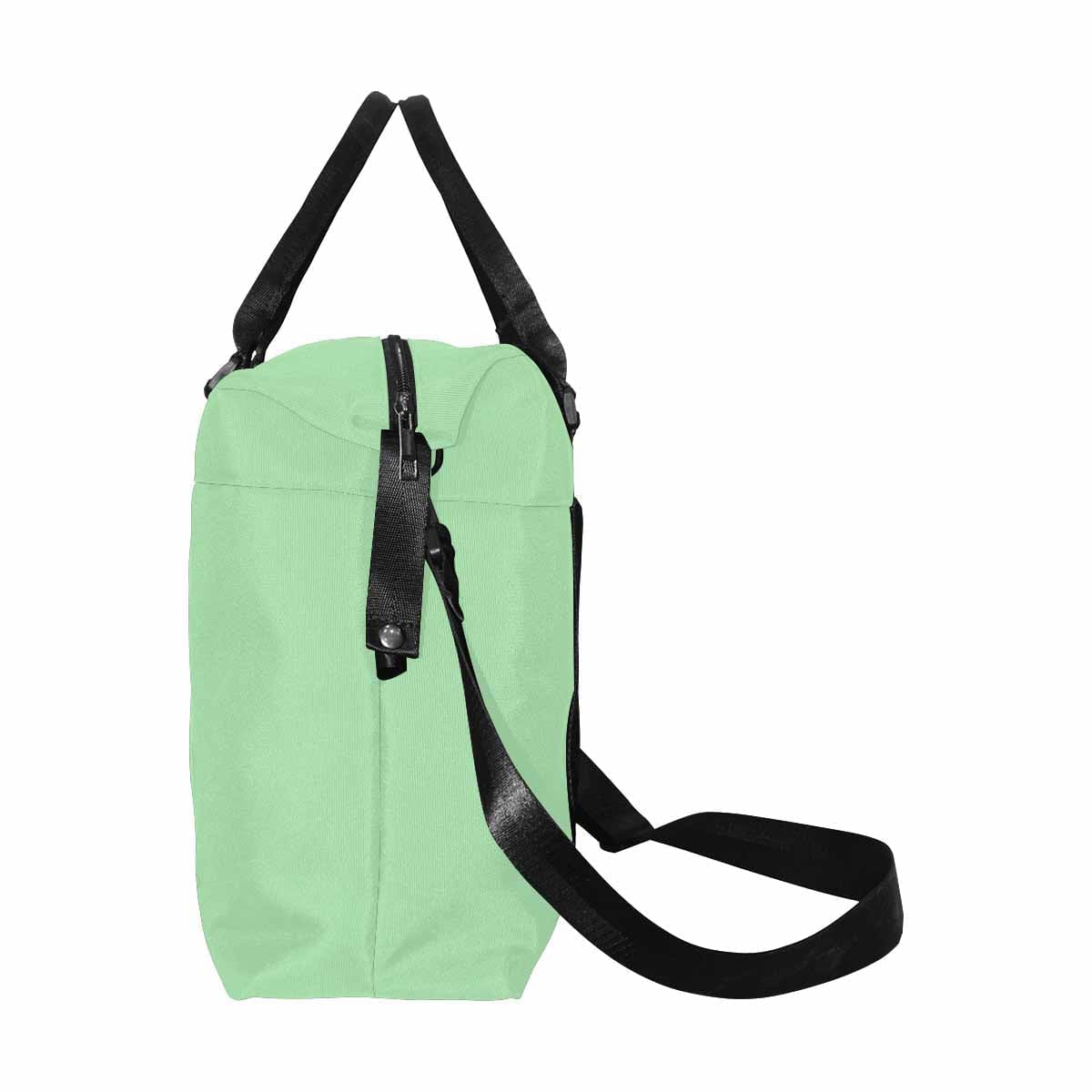 Celadon Green Duffel Bag showcasing its large size and durable oxford fabric, perfect for travel.