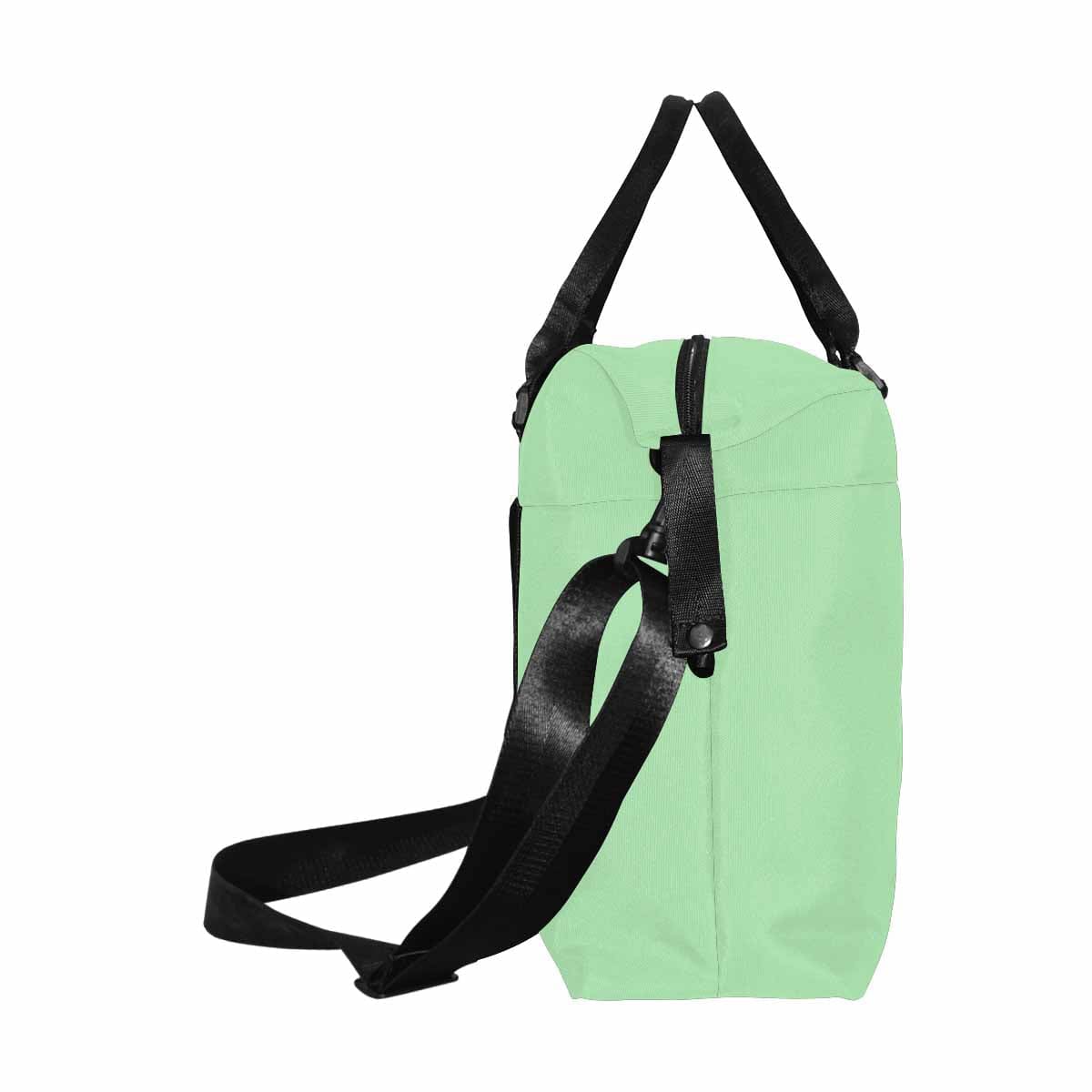 Celadon Green Duffel Bag showcasing its large size and durable oxford fabric, perfect for travel.